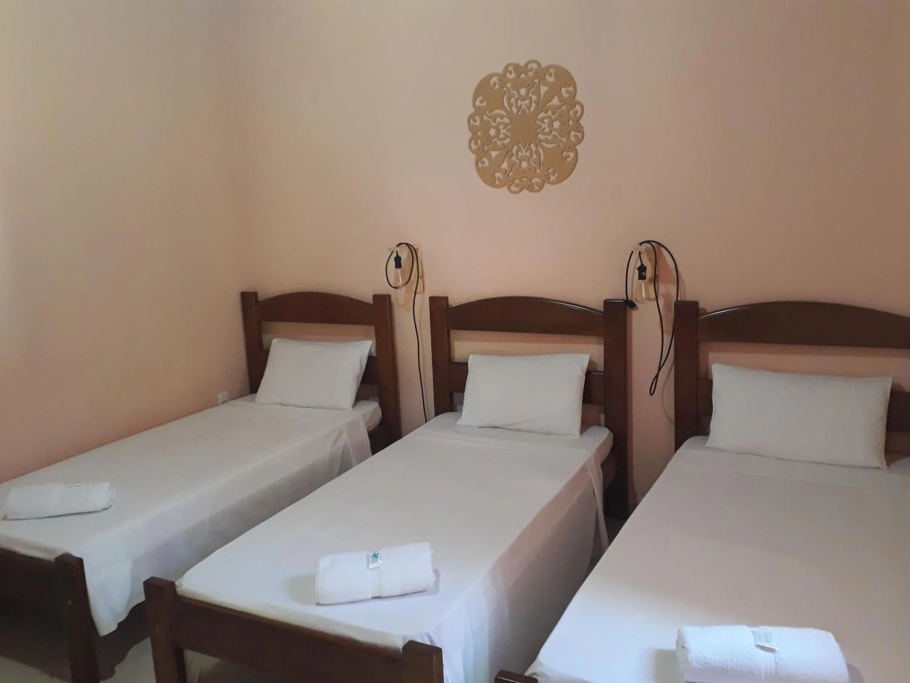 Bed in Pousada Licuri