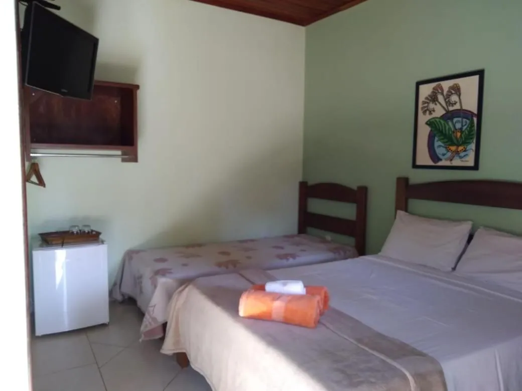 Bed in Pousada Licuri