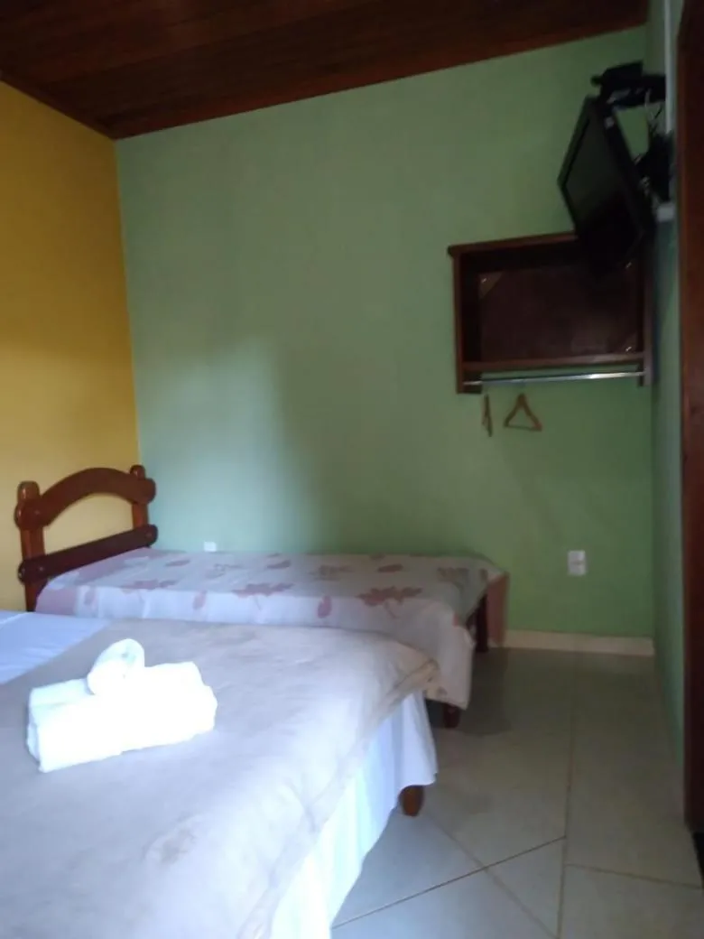 Bed in Pousada Licuri