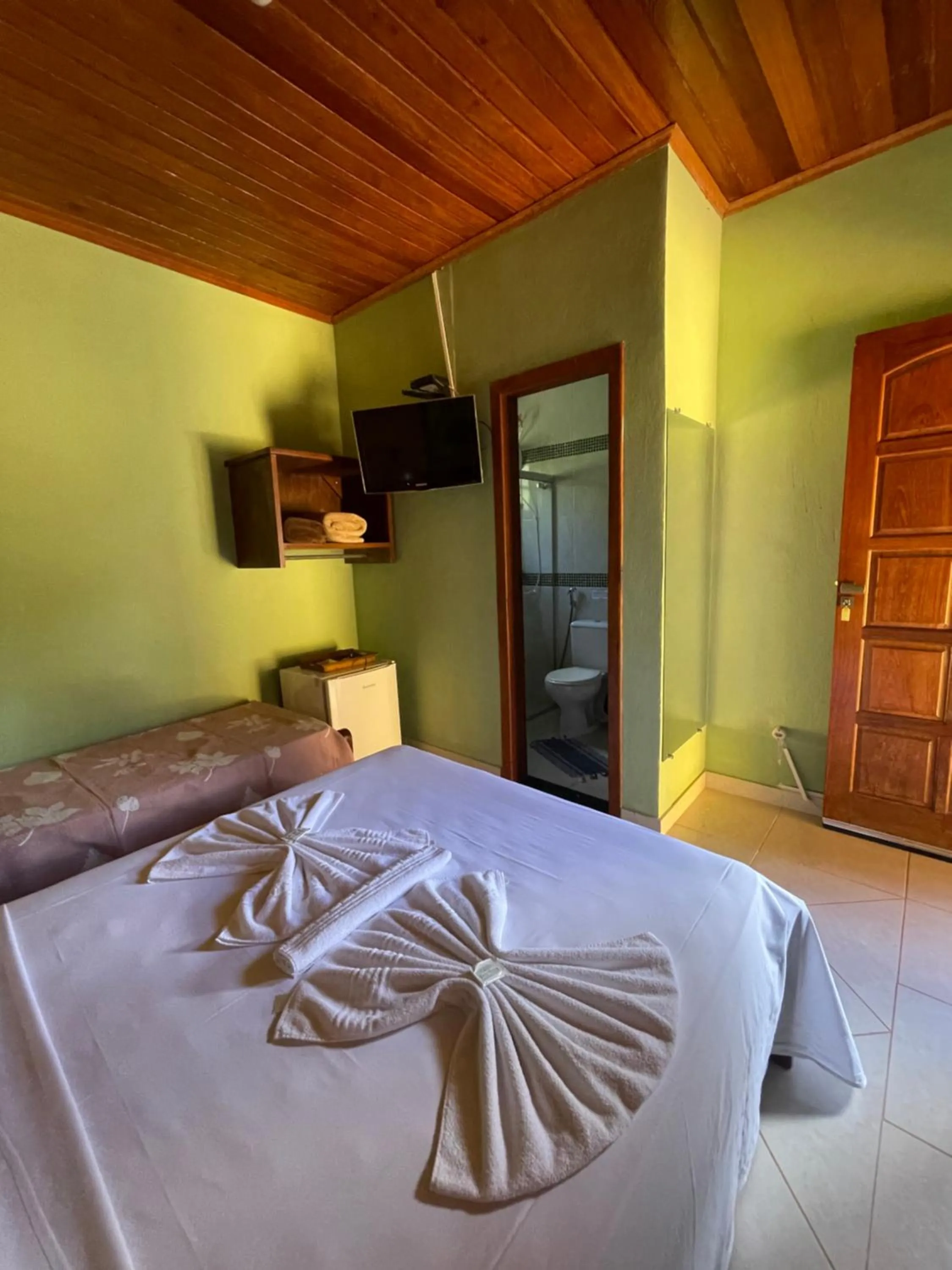 Bed in Pousada Licuri