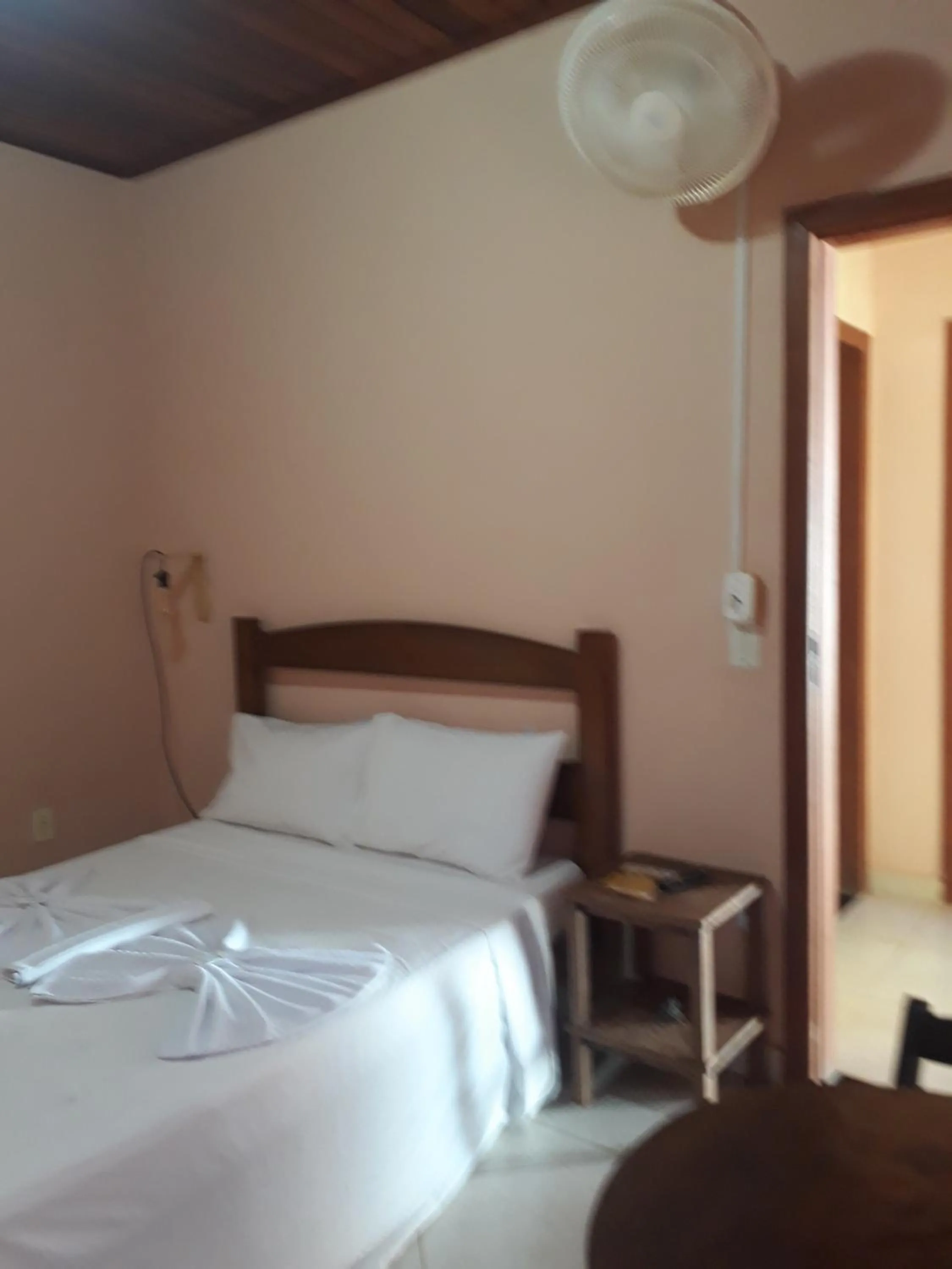 Bed in Pousada Licuri
