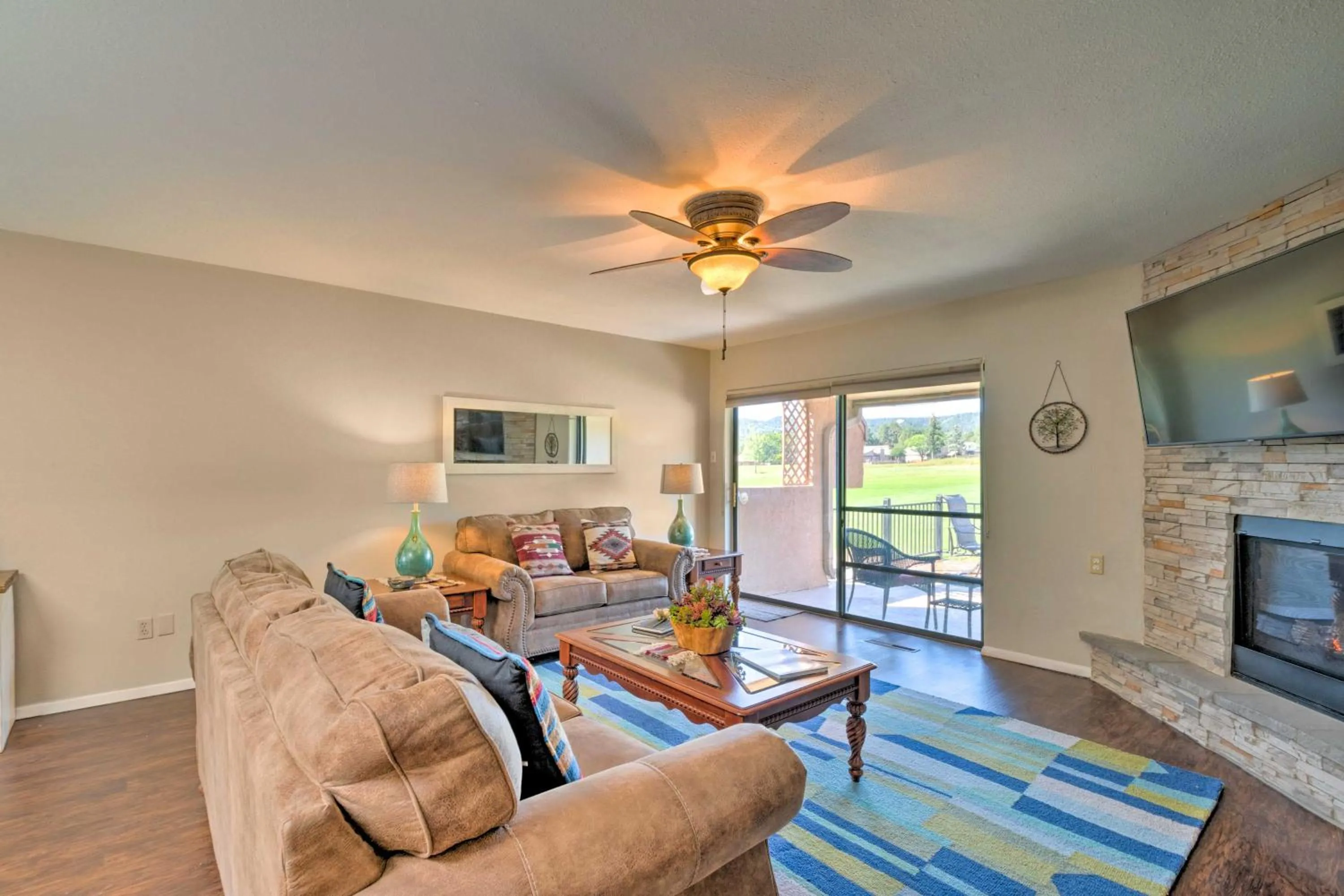 Bright Ruidoso Condo with Deck and Golf Course Views!