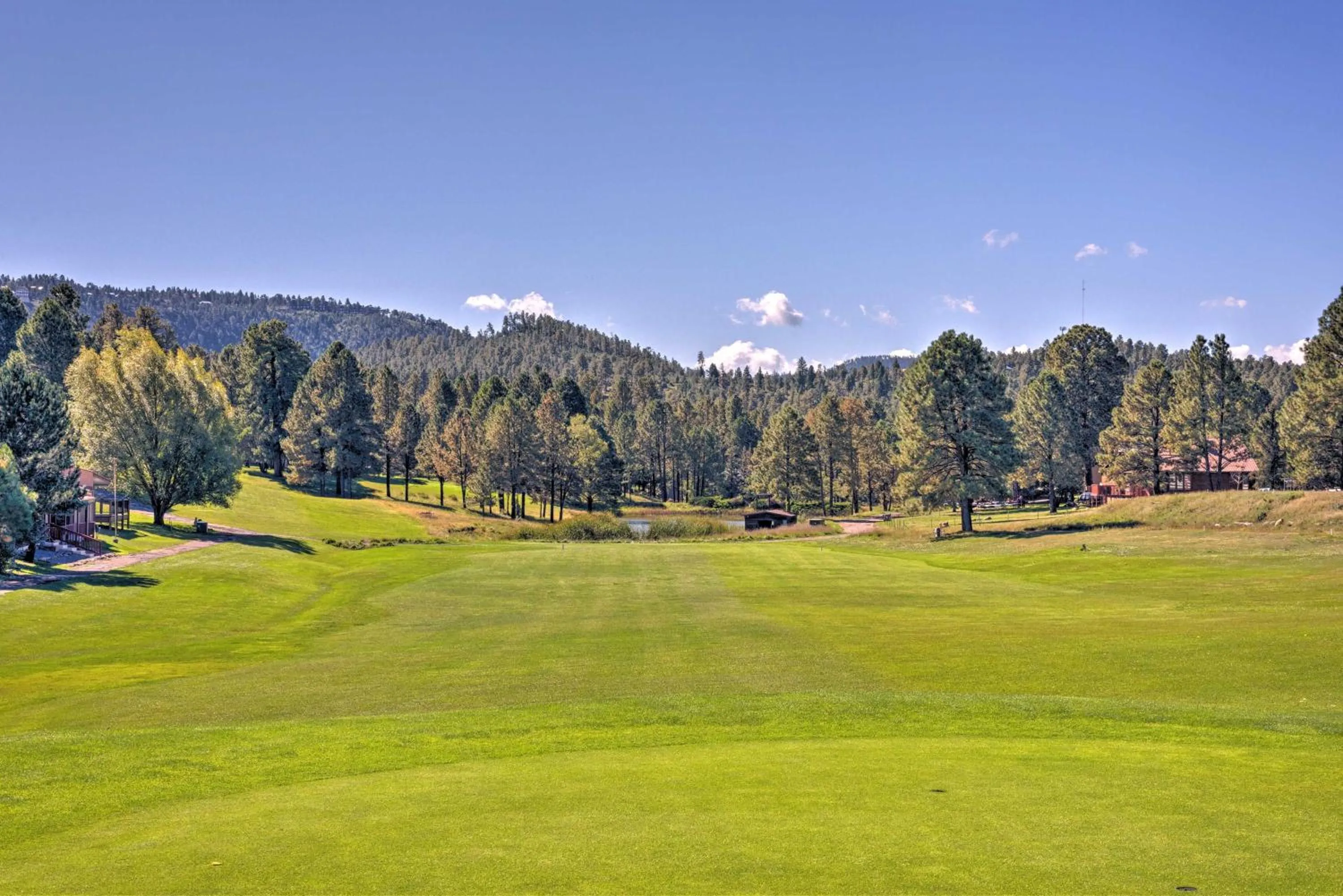 Bright Ruidoso Condo with Deck and Golf Course Views!
