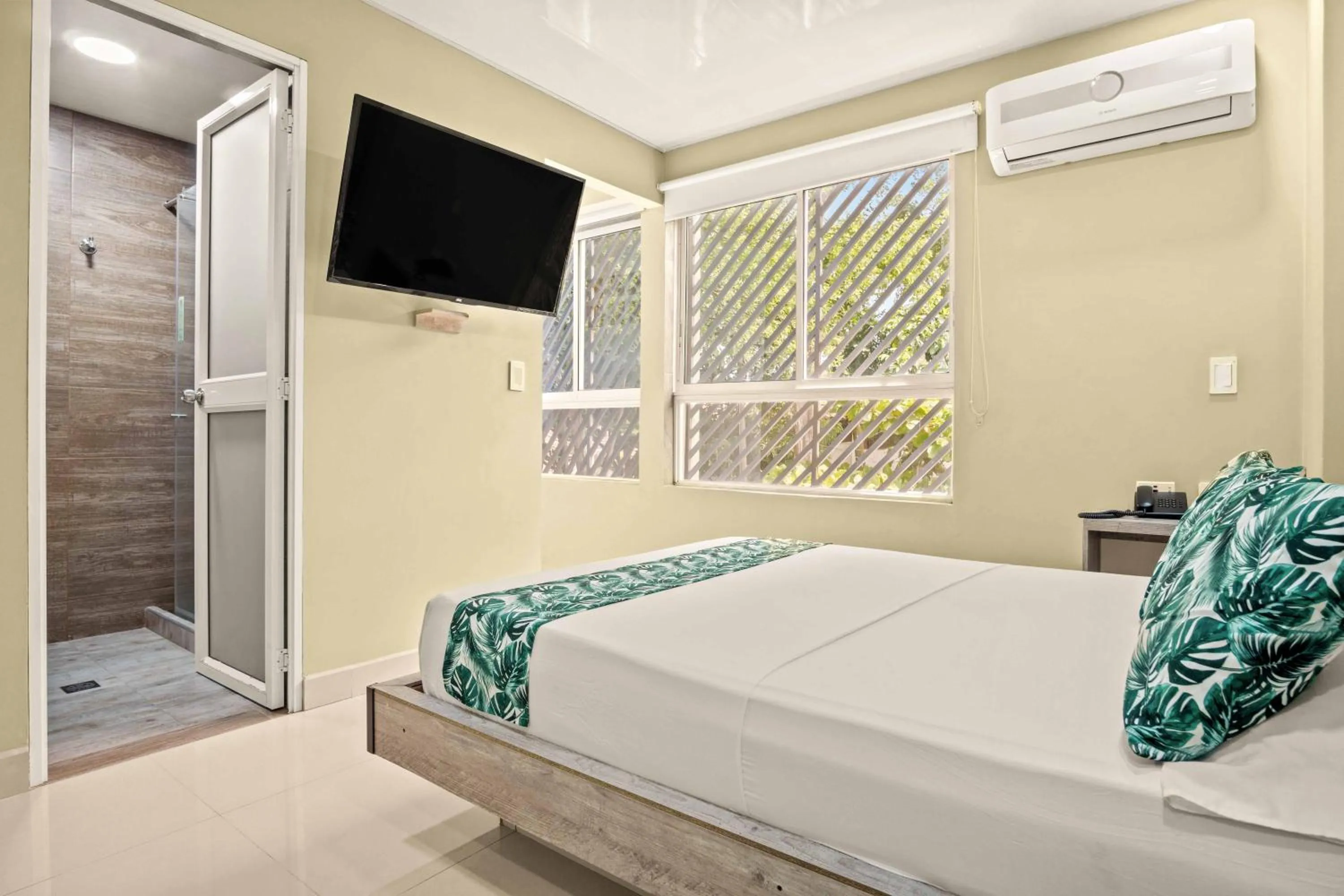 Bed in Aparta Hotel EcoSuite