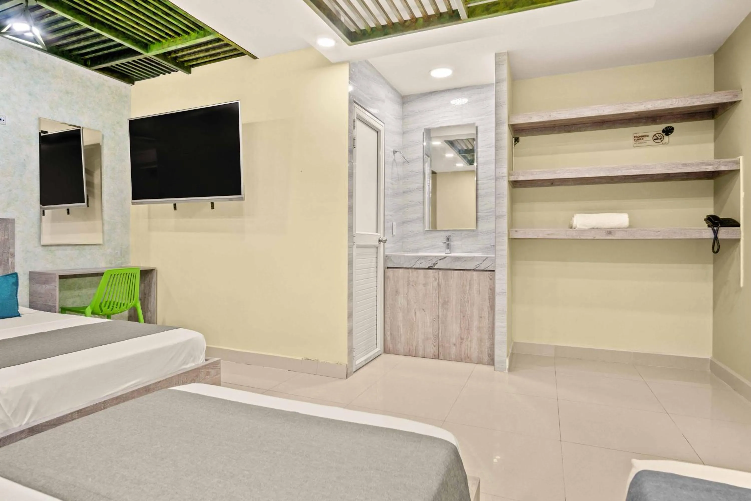 Bed in Aparta Hotel EcoSuite