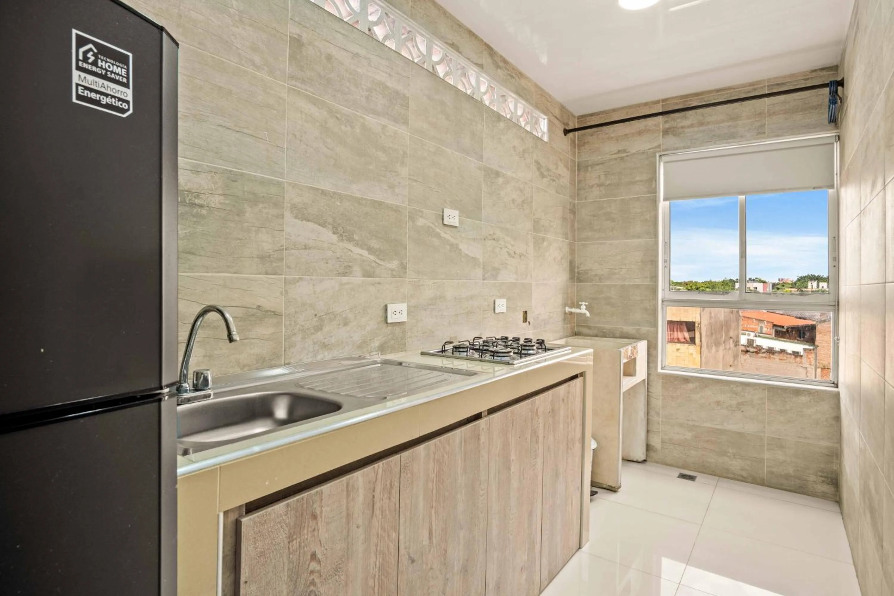 Kitchen or kitchenette in Aparta Hotel EcoSuite