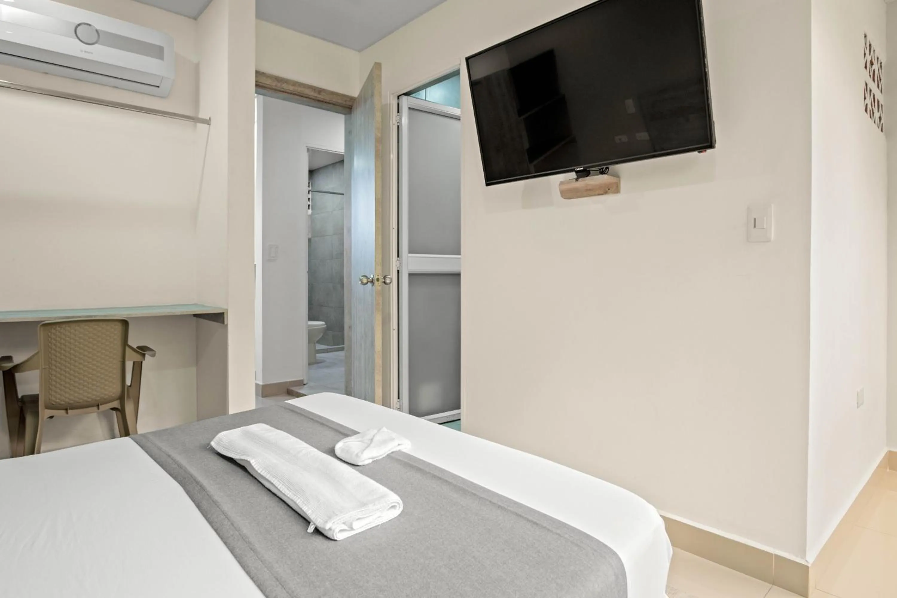 Bed in Aparta Hotel EcoSuite