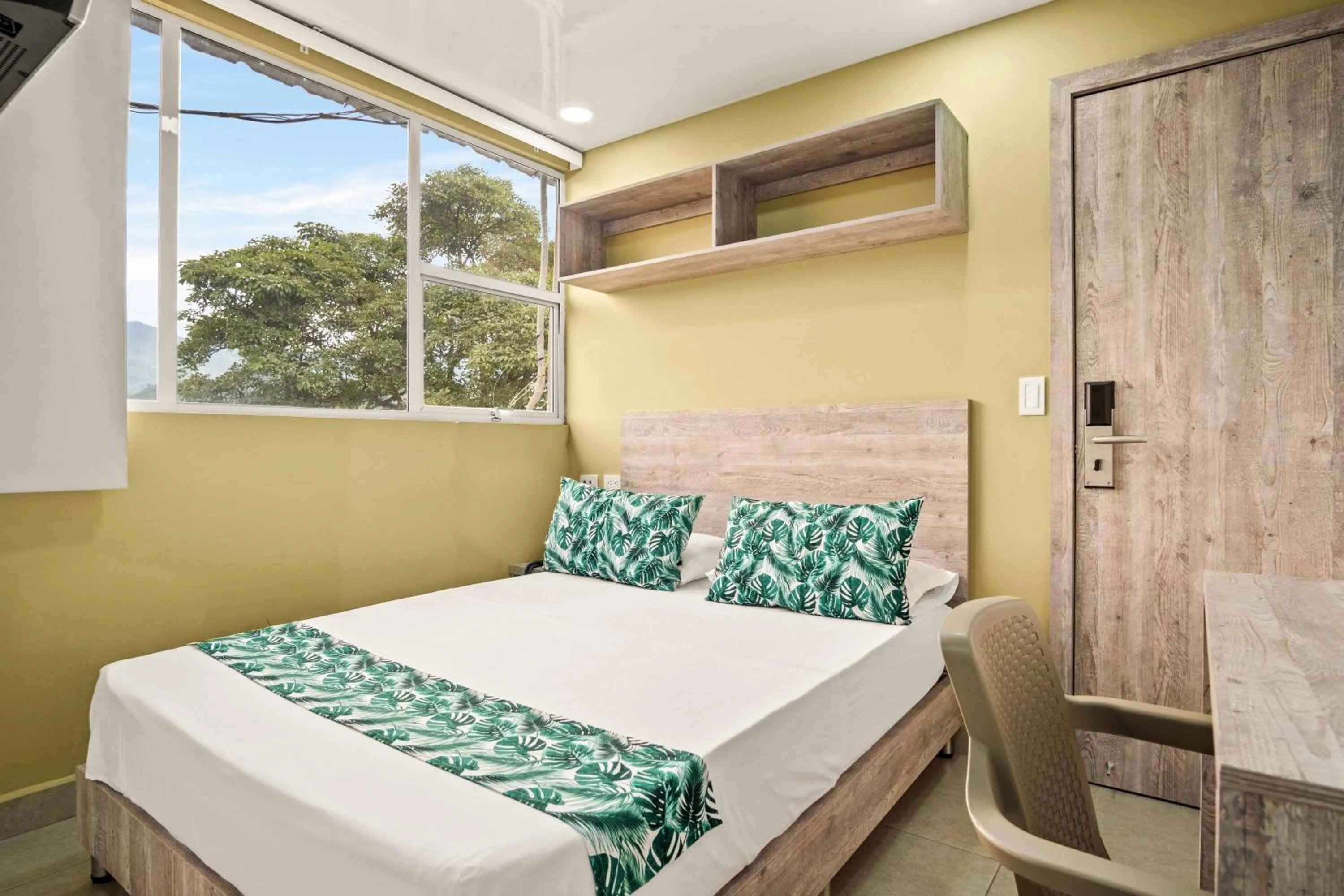 Bed in Aparta Hotel EcoSuite