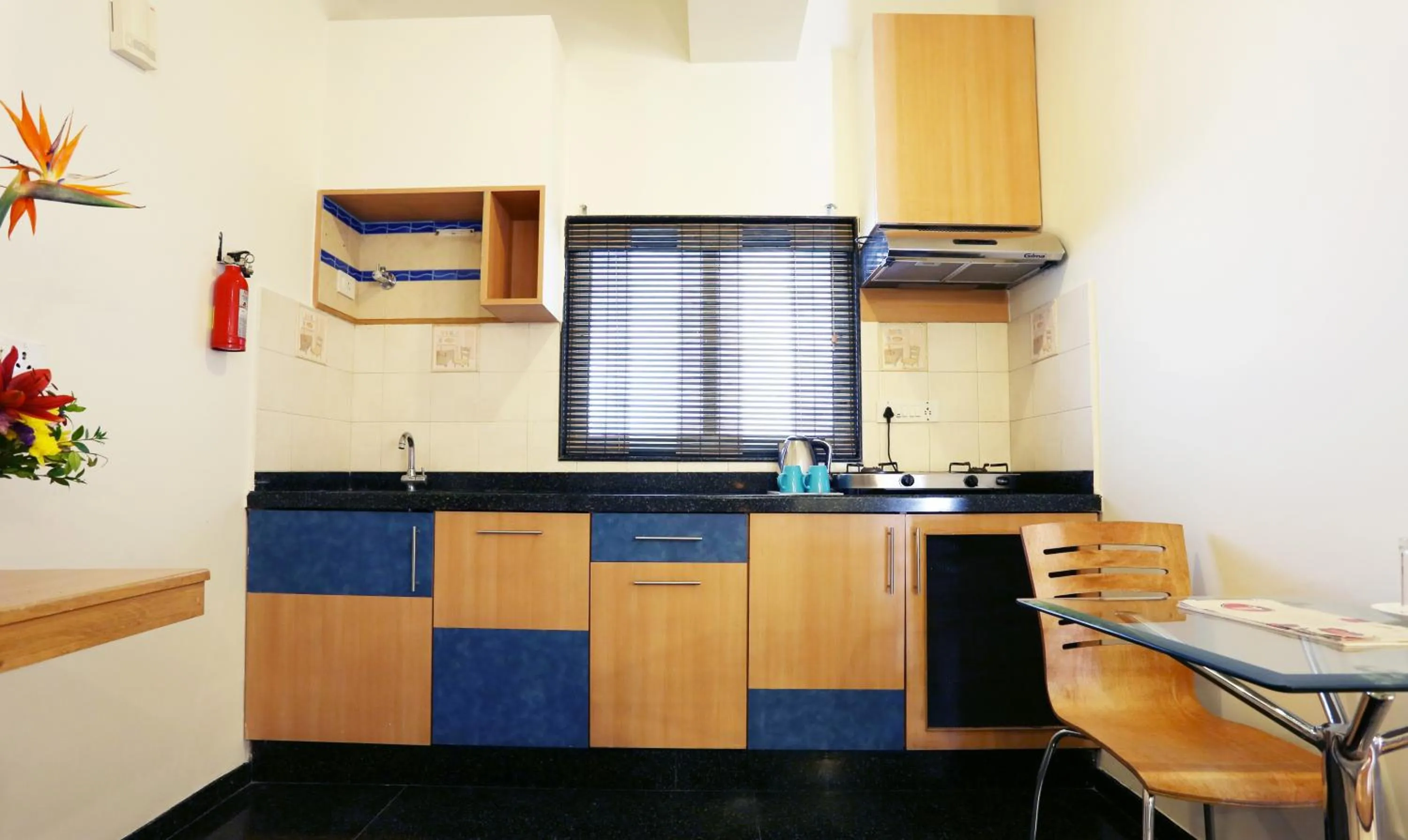 Kitchen or kitchenette in Treebo Edha Suites Koramangala