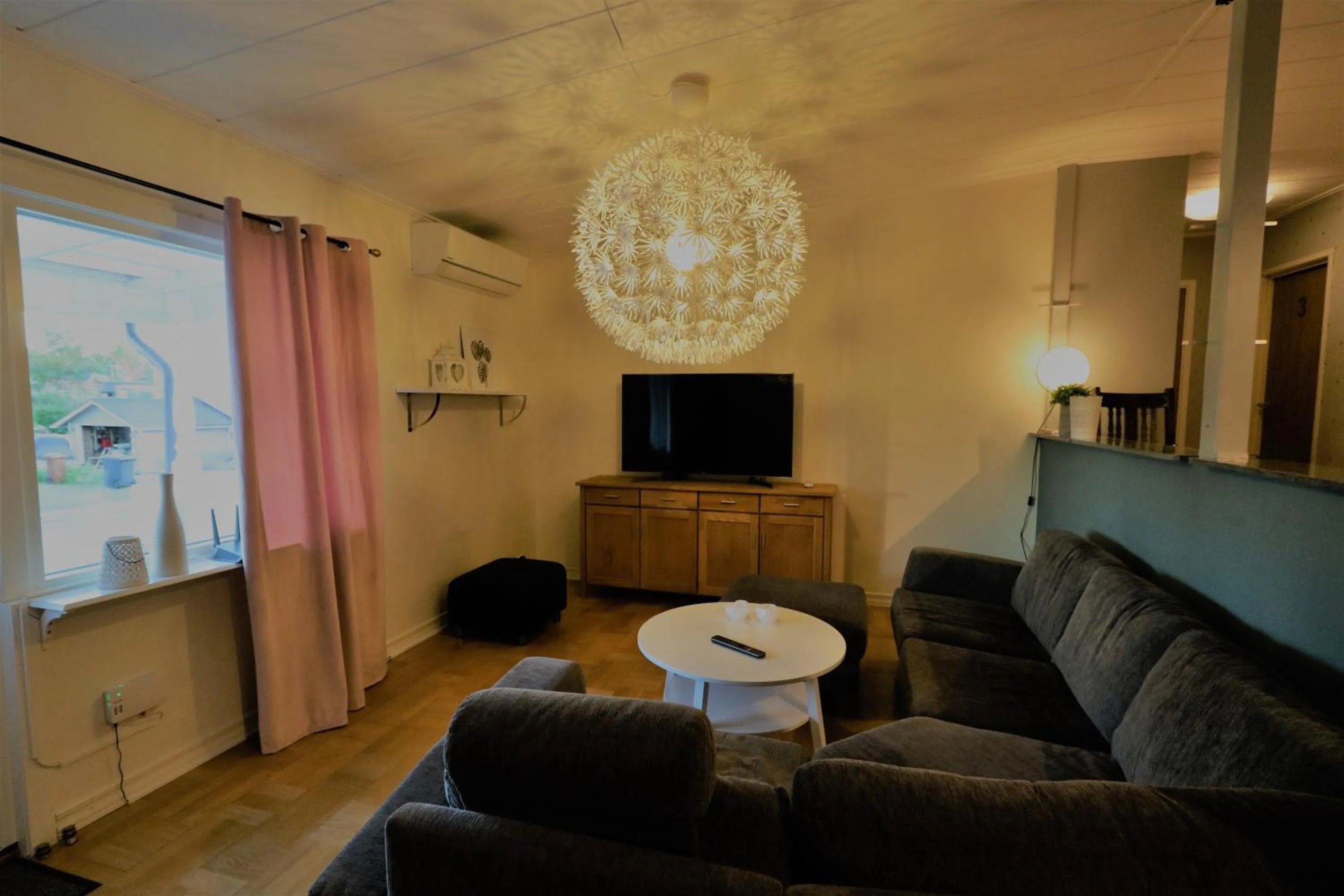 Communal lounge/ TV room in RIBO Apartment Aurora