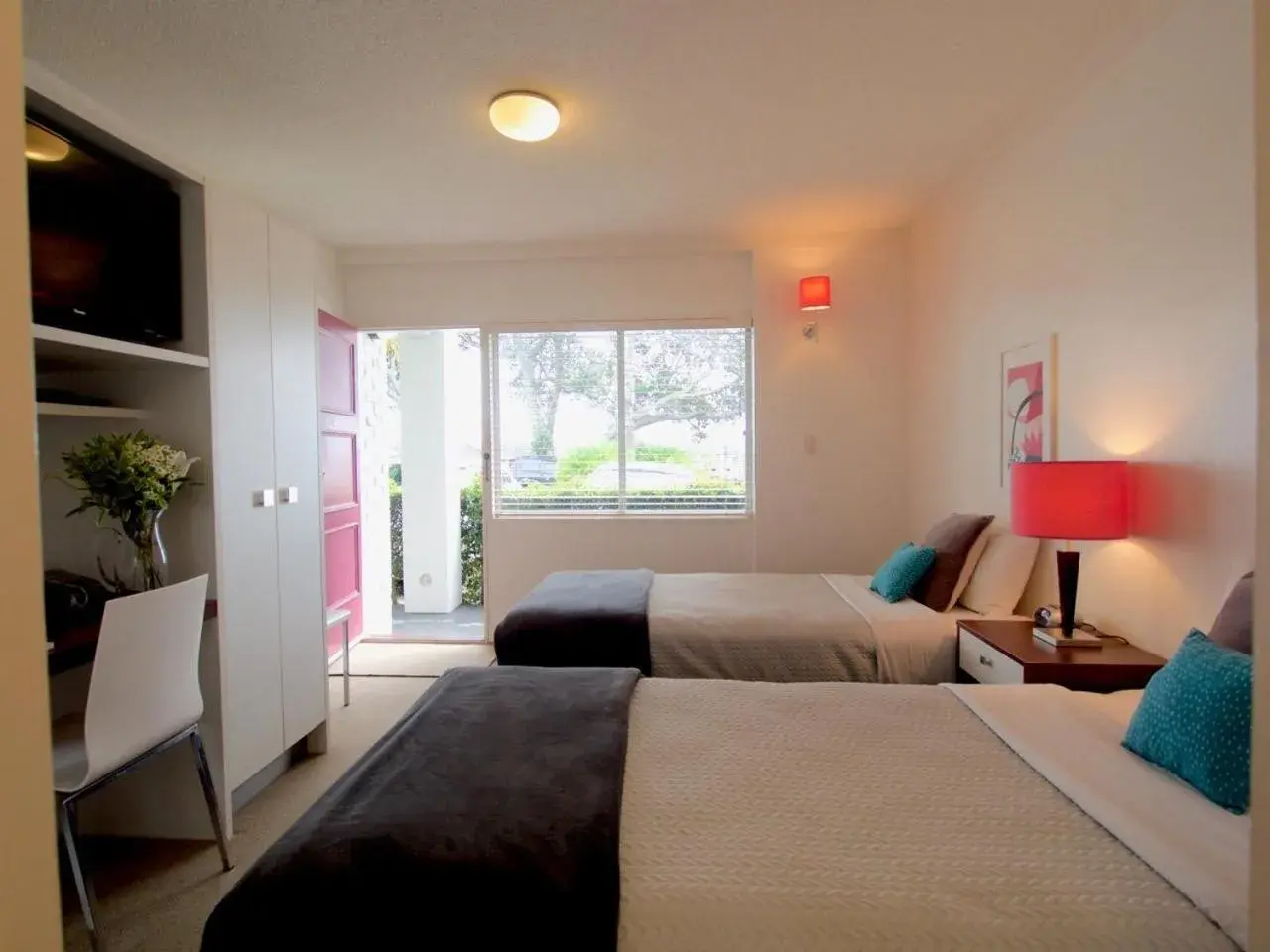 Bed in Mt Albert Motor Lodge