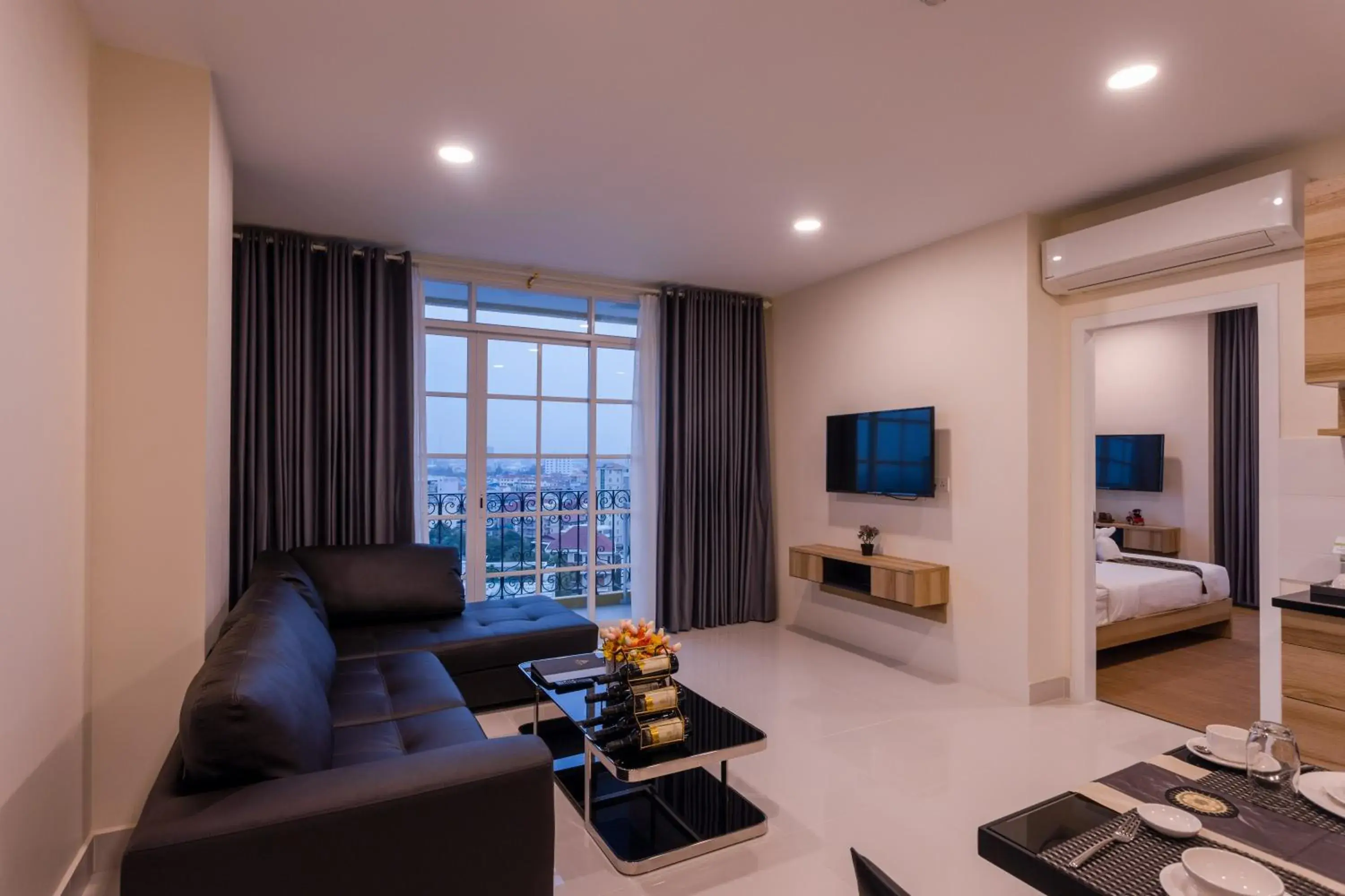 Seating area, Bed in TK VIEW HOTEL & APARTMENT Seating area, Bed in TK VIEW HOTEL & APARTMENT