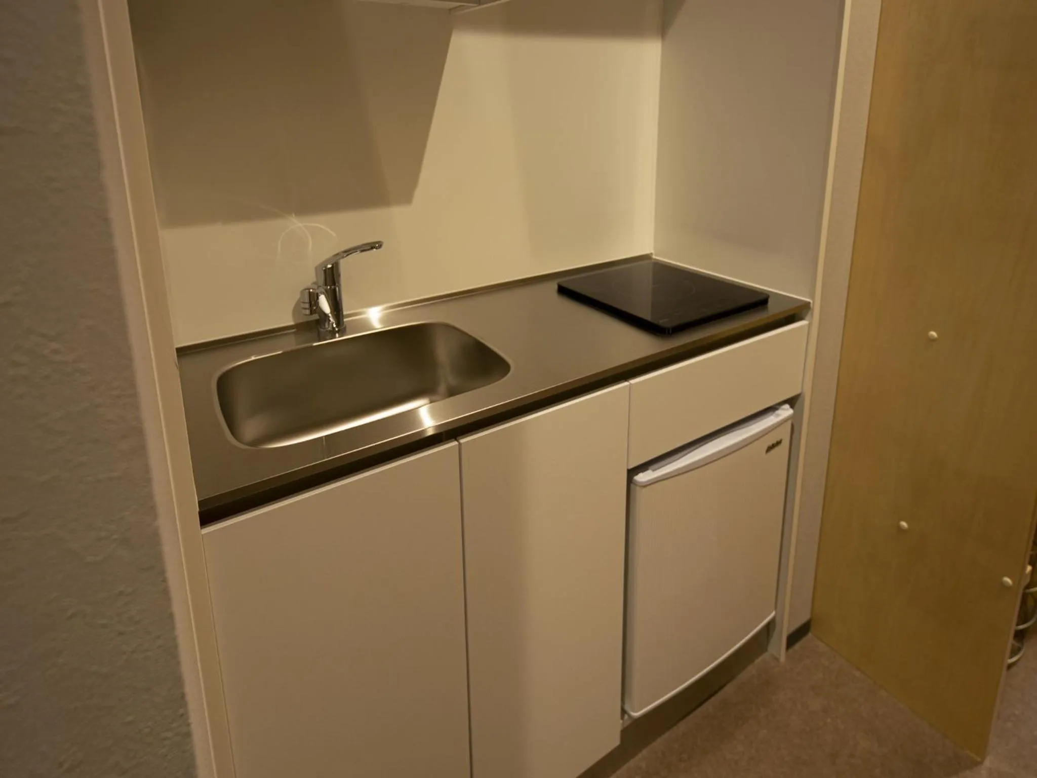 Kitchen or kitchenette in UCHI SUSUKINO WEST by Hotel Wheat