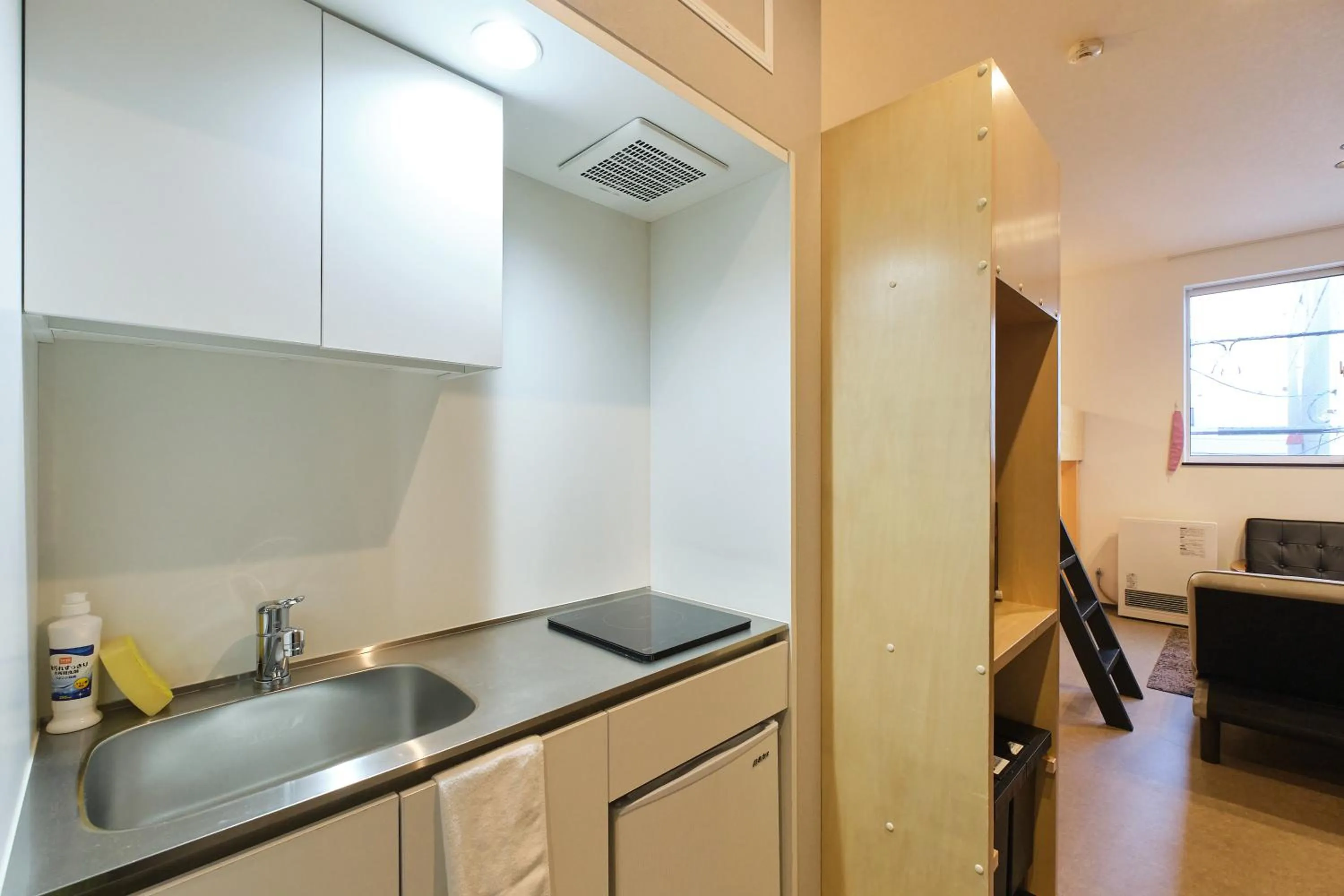 kitchen in UCHI SUSUKINO WEST by Hotel Wheat