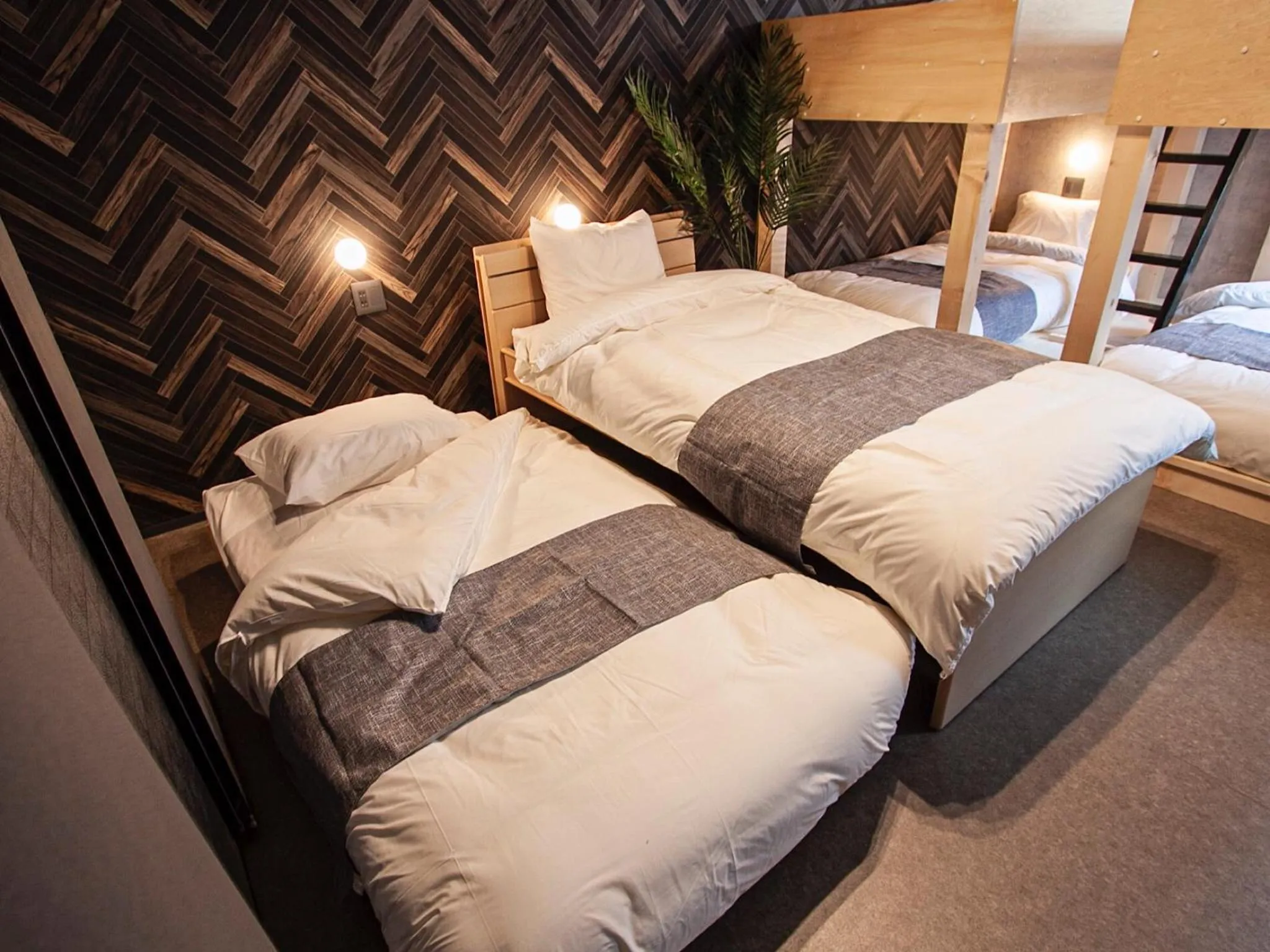 Bed in UCHI SUSUKINO WEST by Hotel Wheat