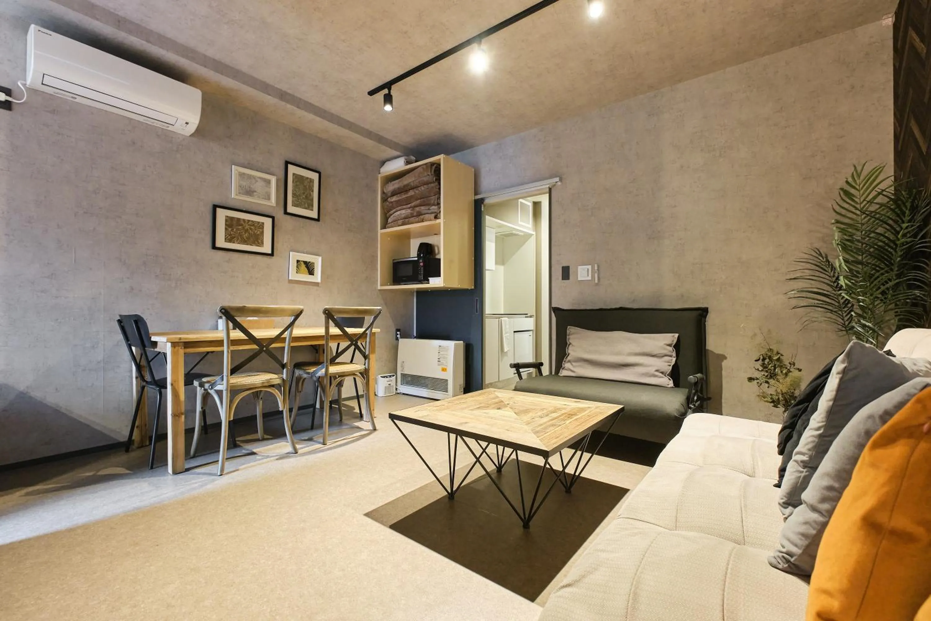 Living room in UCHI SUSUKINO WEST by Hotel Wheat