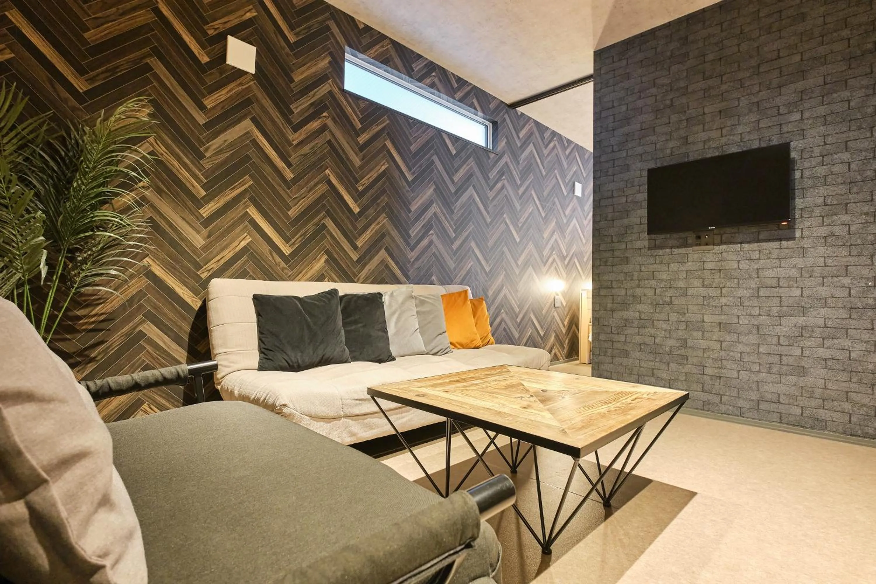 Living room in UCHI SUSUKINO WEST by Hotel Wheat