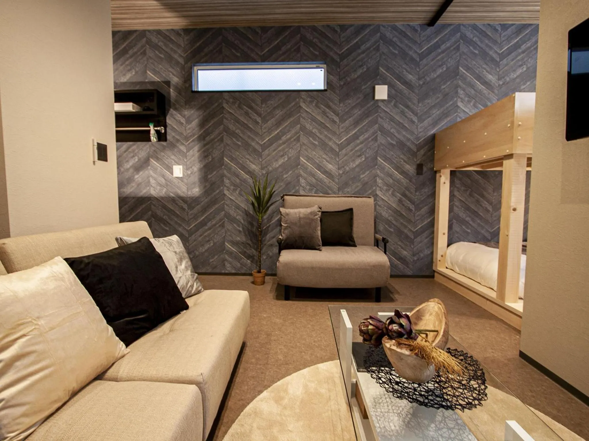 Living room in UCHI SUSUKINO WEST by Hotel Wheat