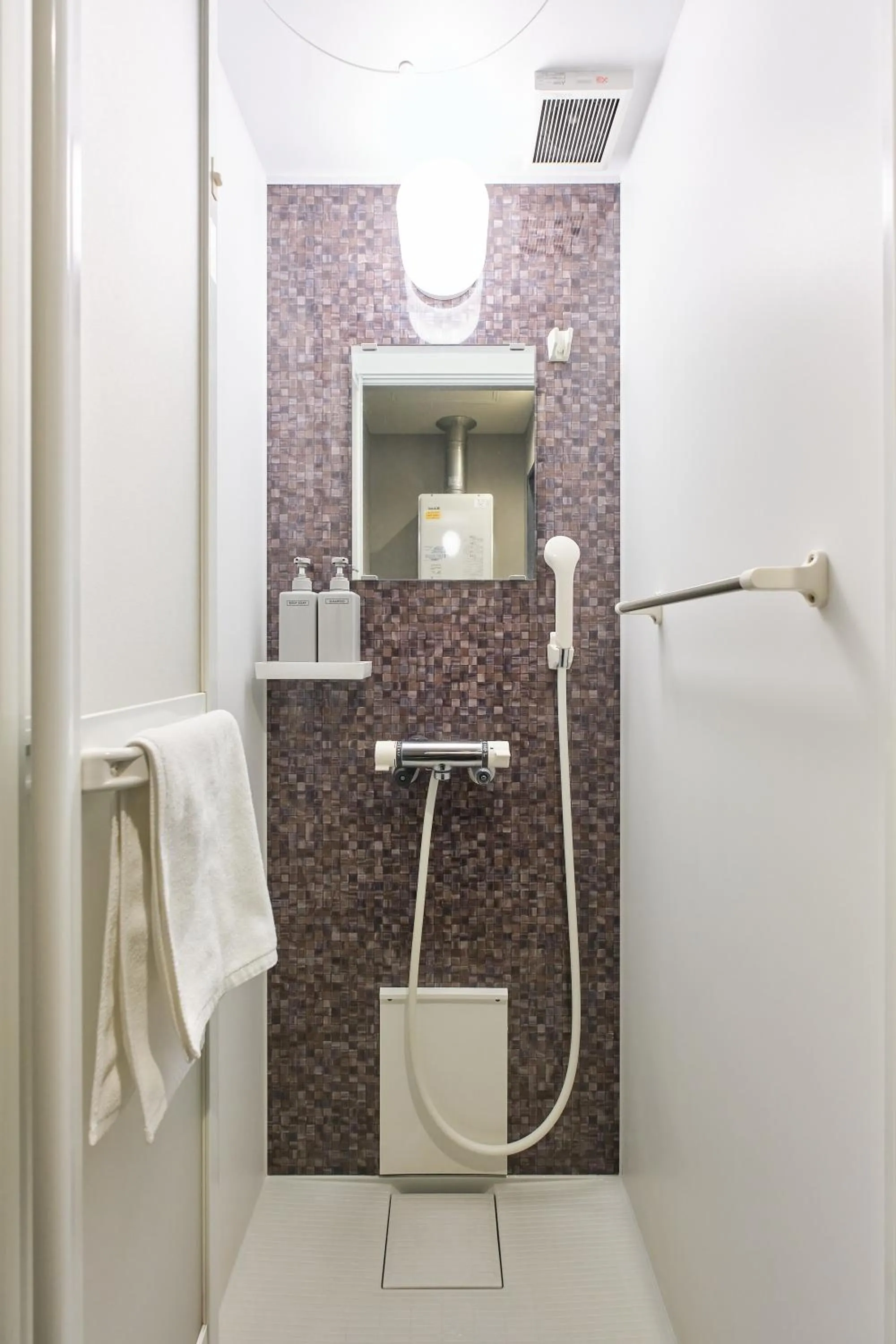 Shower in UCHI SUSUKINO WEST by Hotel Wheat