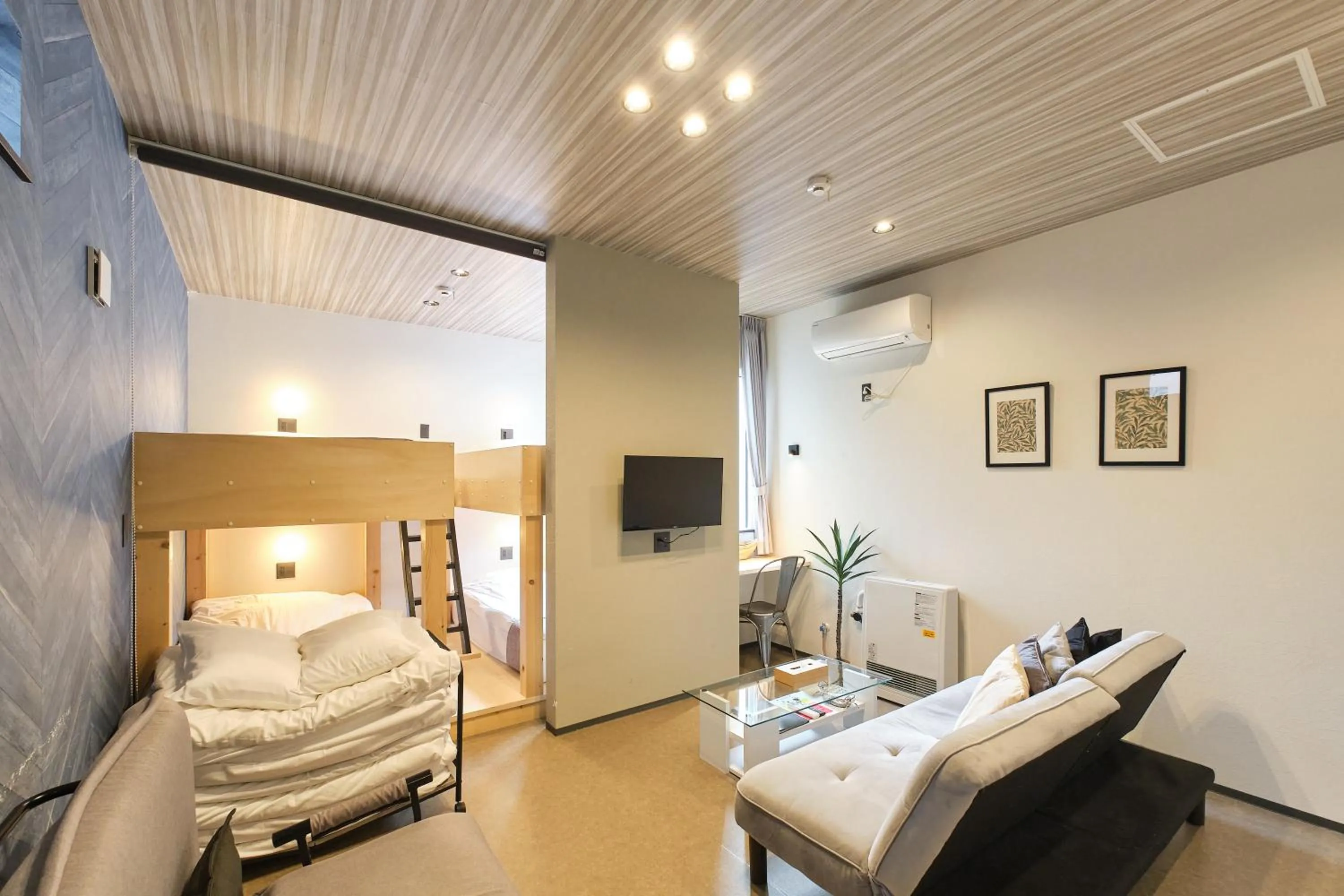 Living room, Bed in UCHI SUSUKINO WEST by Hotel Wheat