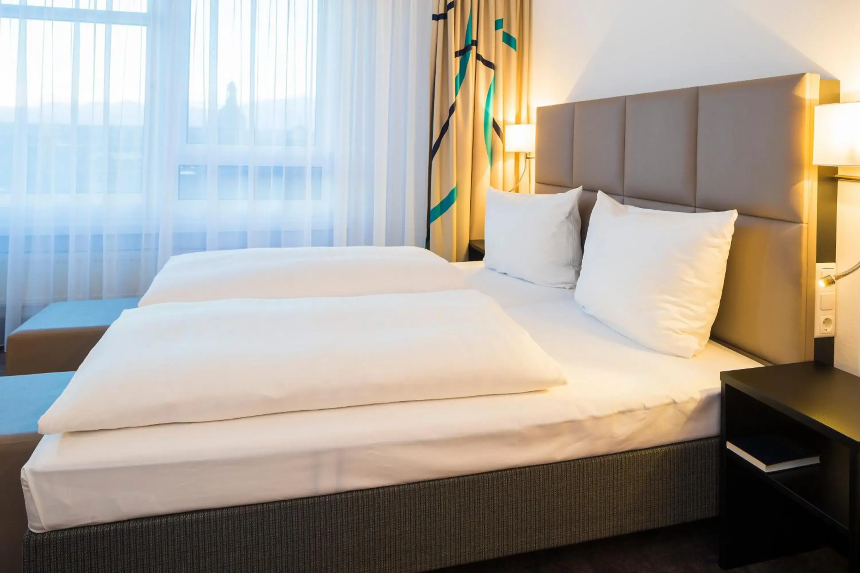 Bed in Hotel Am Terrassenufer Bed in Hotel Am Terrassenufer