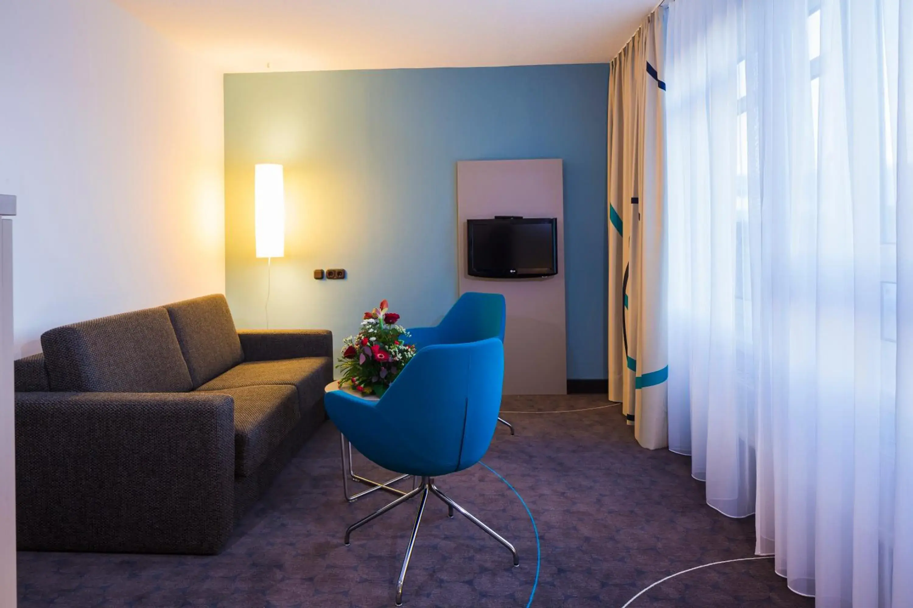 Living room in Hotel Am Terrassenufer Living room in Hotel Am Terrassenufer