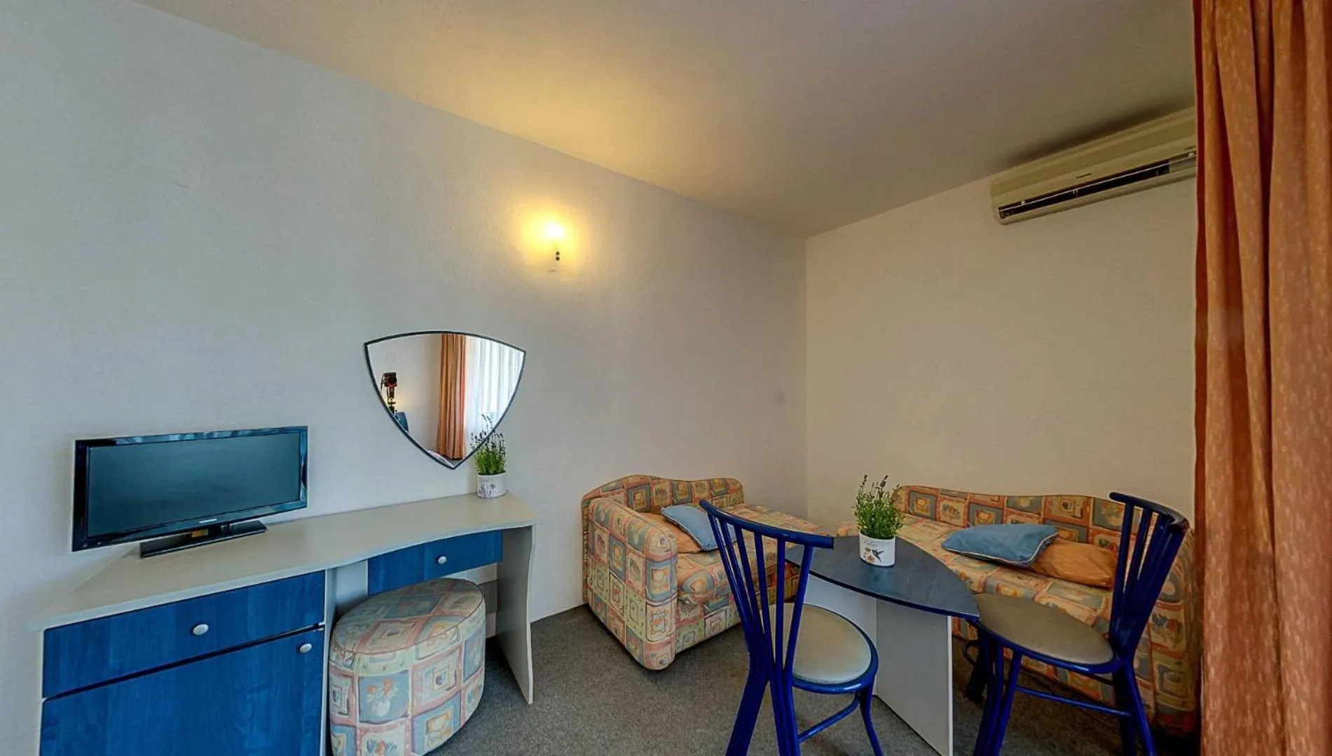 Seating area in Elmar Hotel