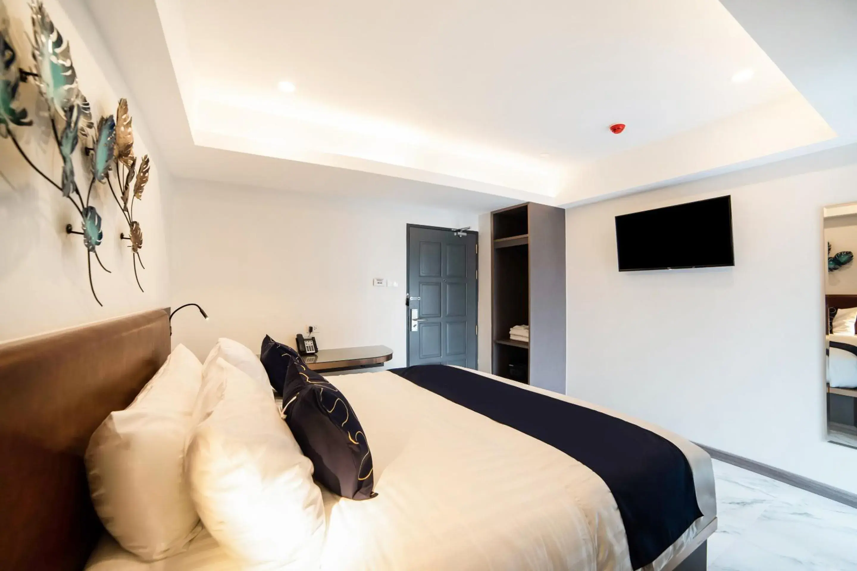 Bed in RoomQuest Sukhumvit36 BTS Thonglor Bed in RoomQuest Sukhumvit36 BTS Thonglor