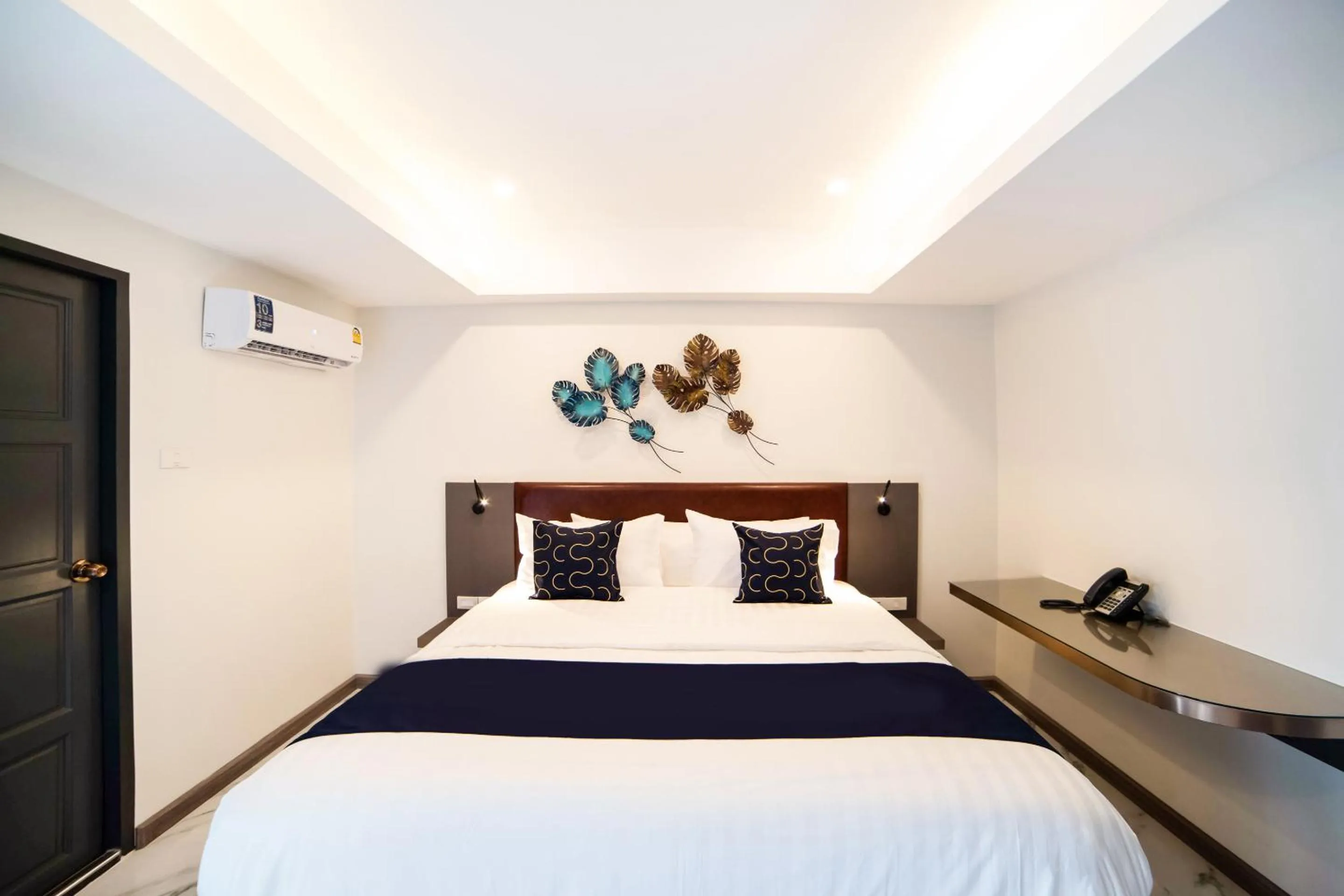 Bed in RoomQuest Sukhumvit36 BTS Thonglor