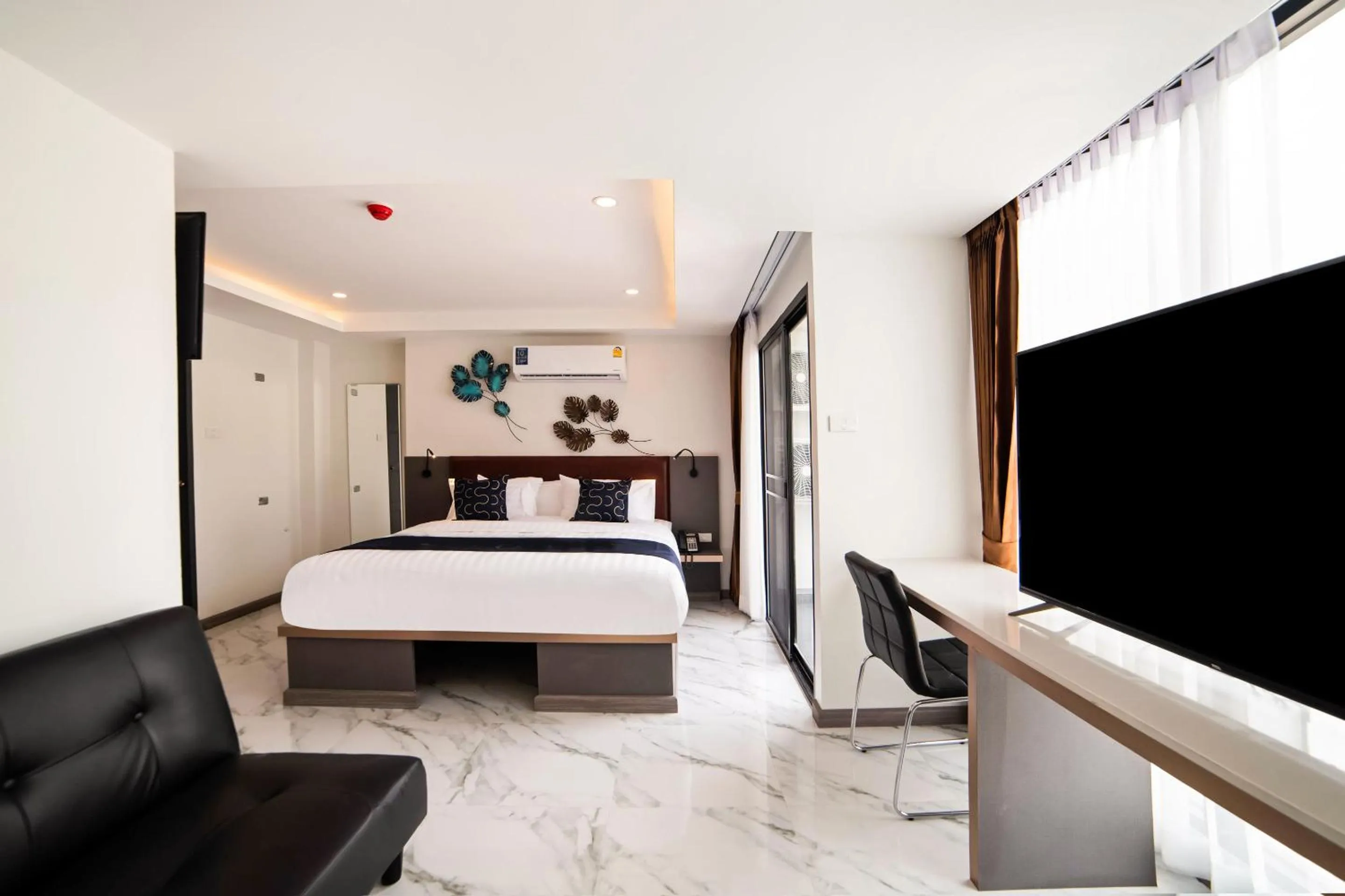 Bed in RoomQuest Sukhumvit36 BTS Thonglor