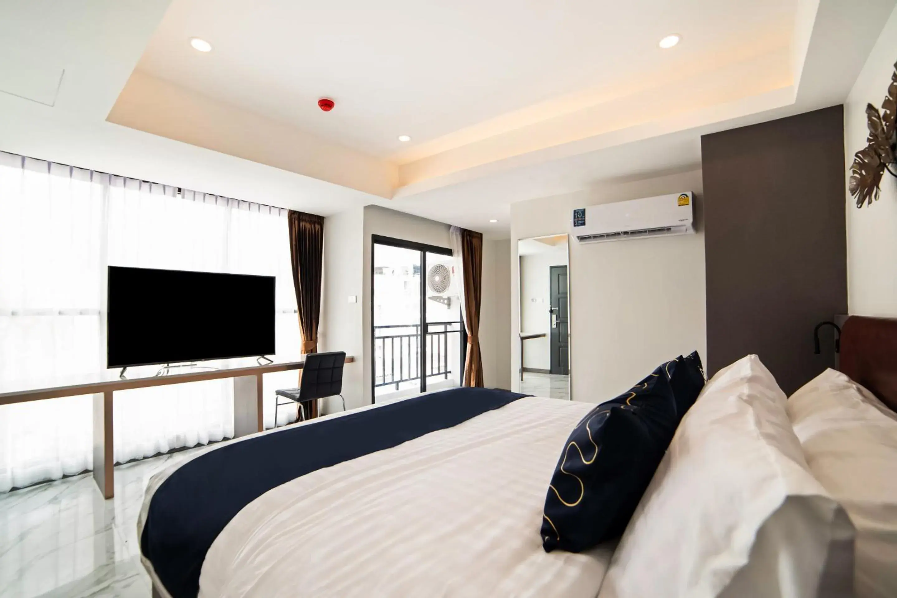 Bed in RoomQuest Sukhumvit36 BTS Thonglor Bed in RoomQuest Sukhumvit36 BTS Thonglor
