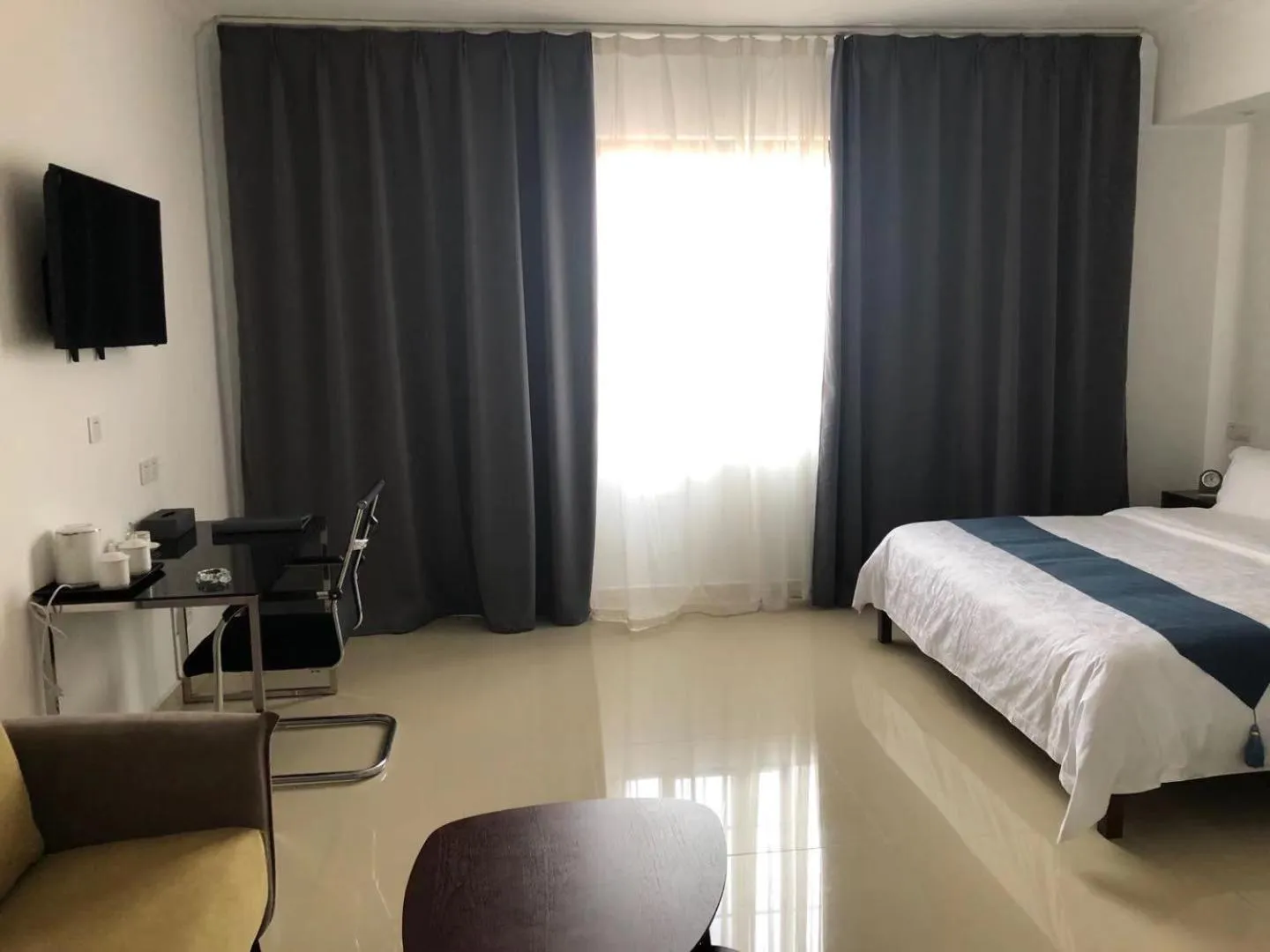 Photo of the whole room, Bed in Feima Hotel