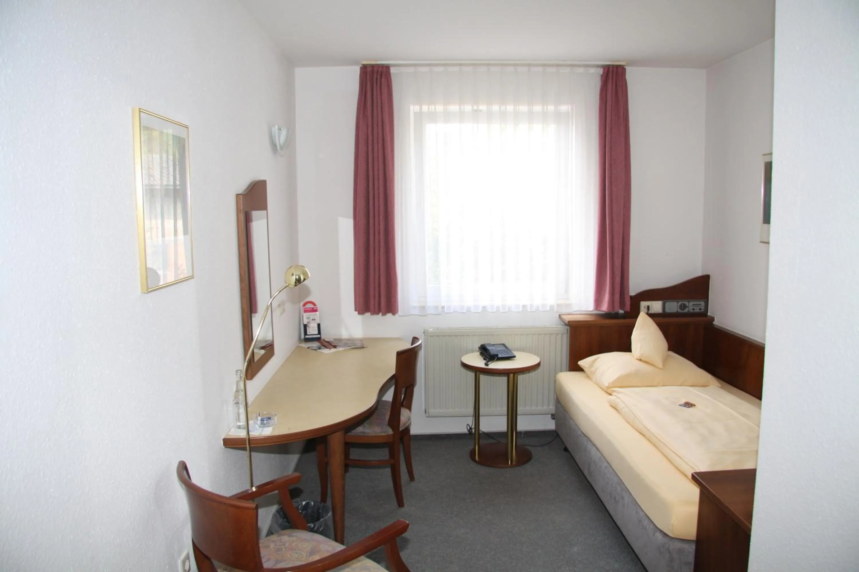 Photo of the whole room, Bed in Akzent Hotel Goldener Ochsen