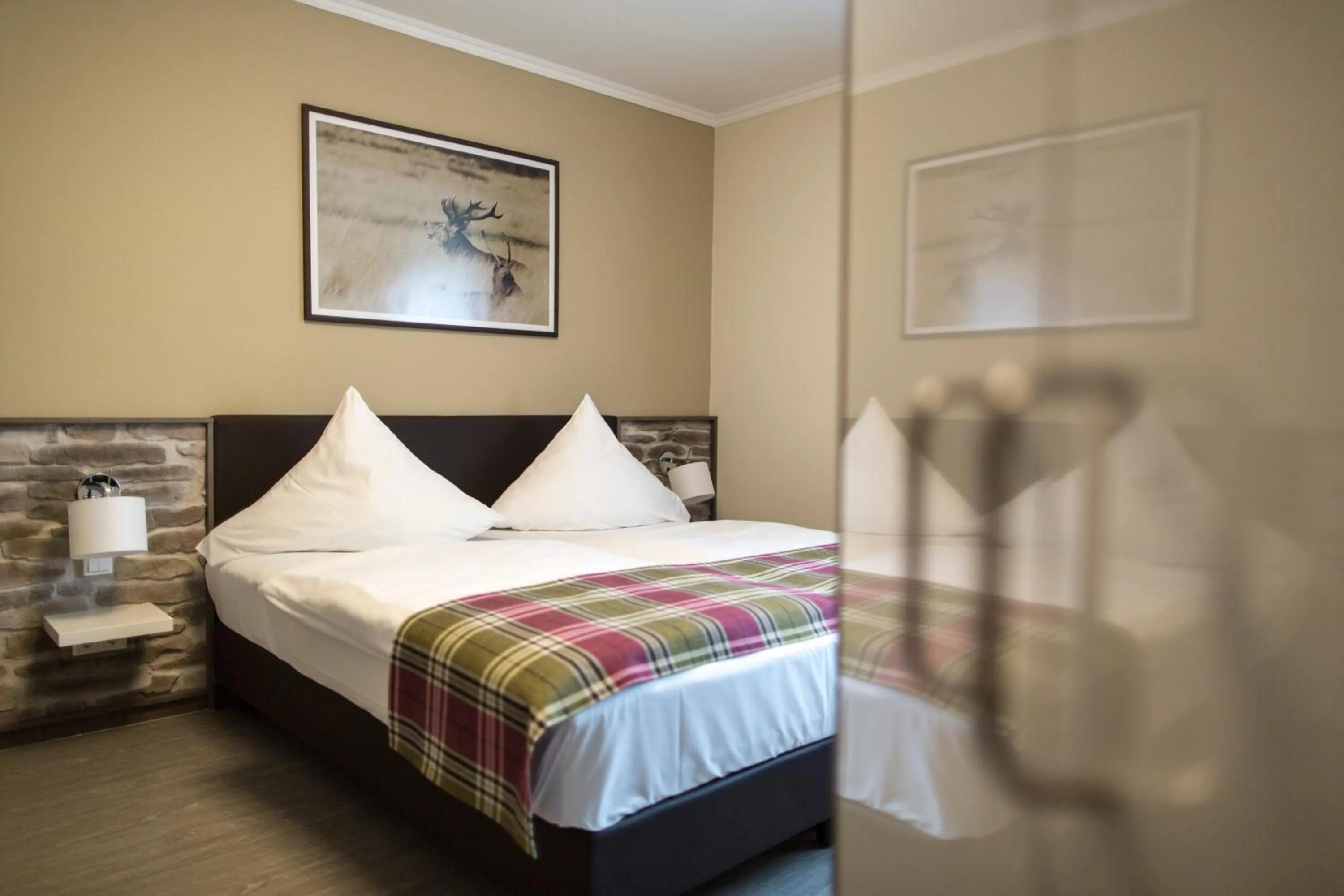 Photo of the whole room, Bed in AKZENT Hotel Thiemann