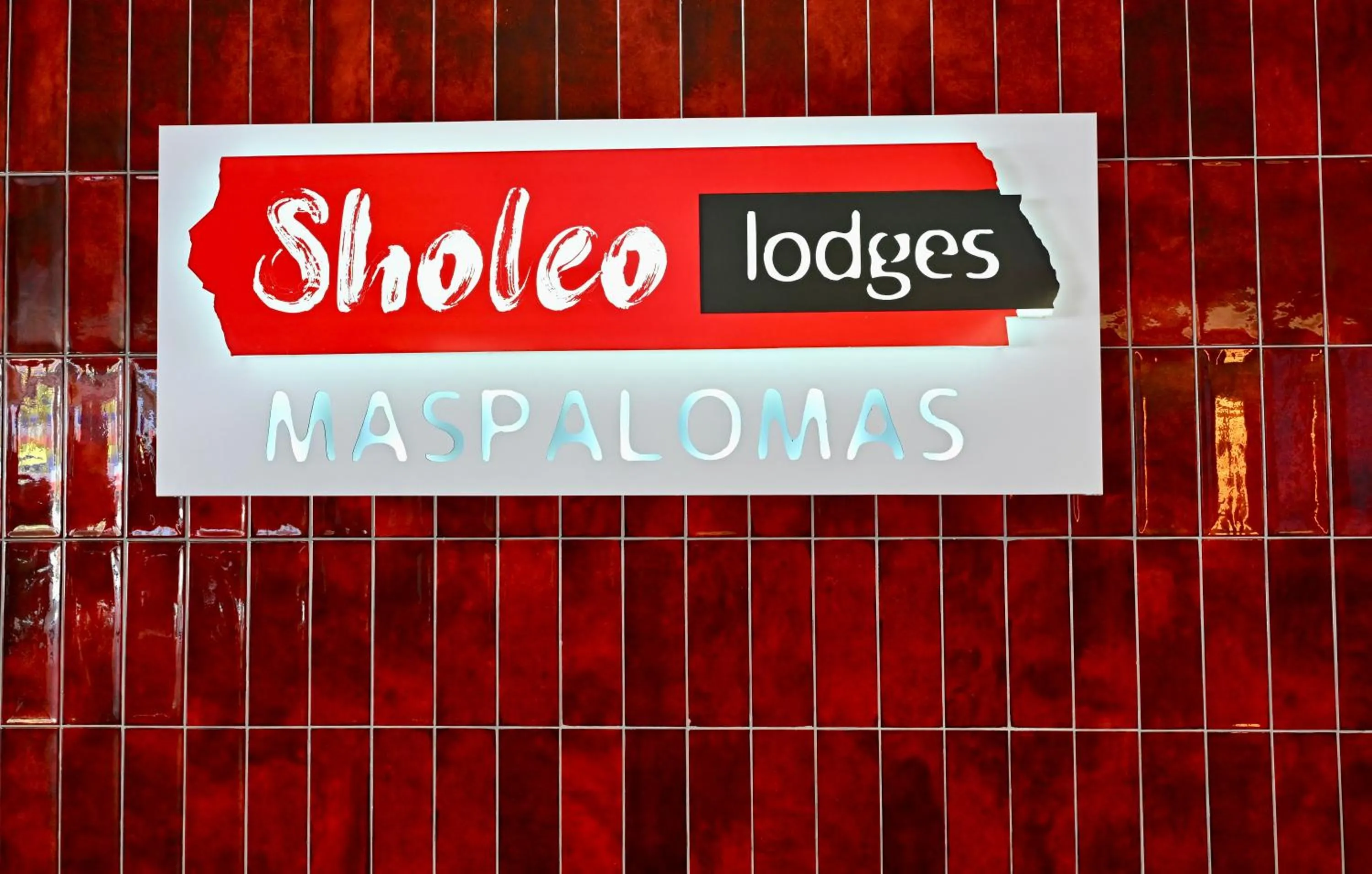 Property logo or sign in Sholeo Lodges Maspalomas