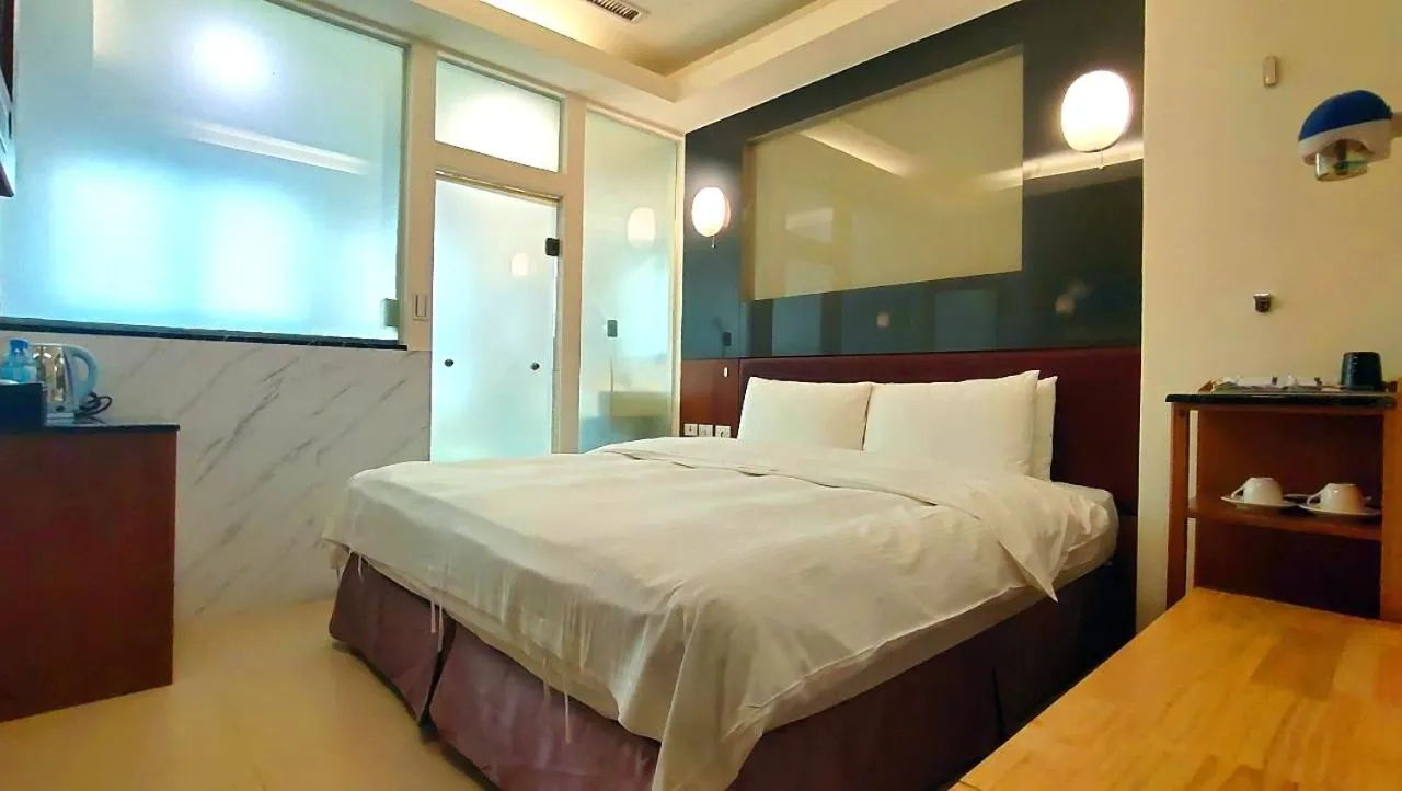 Bed in Jin Yong Quan Spa Hotspring Resort