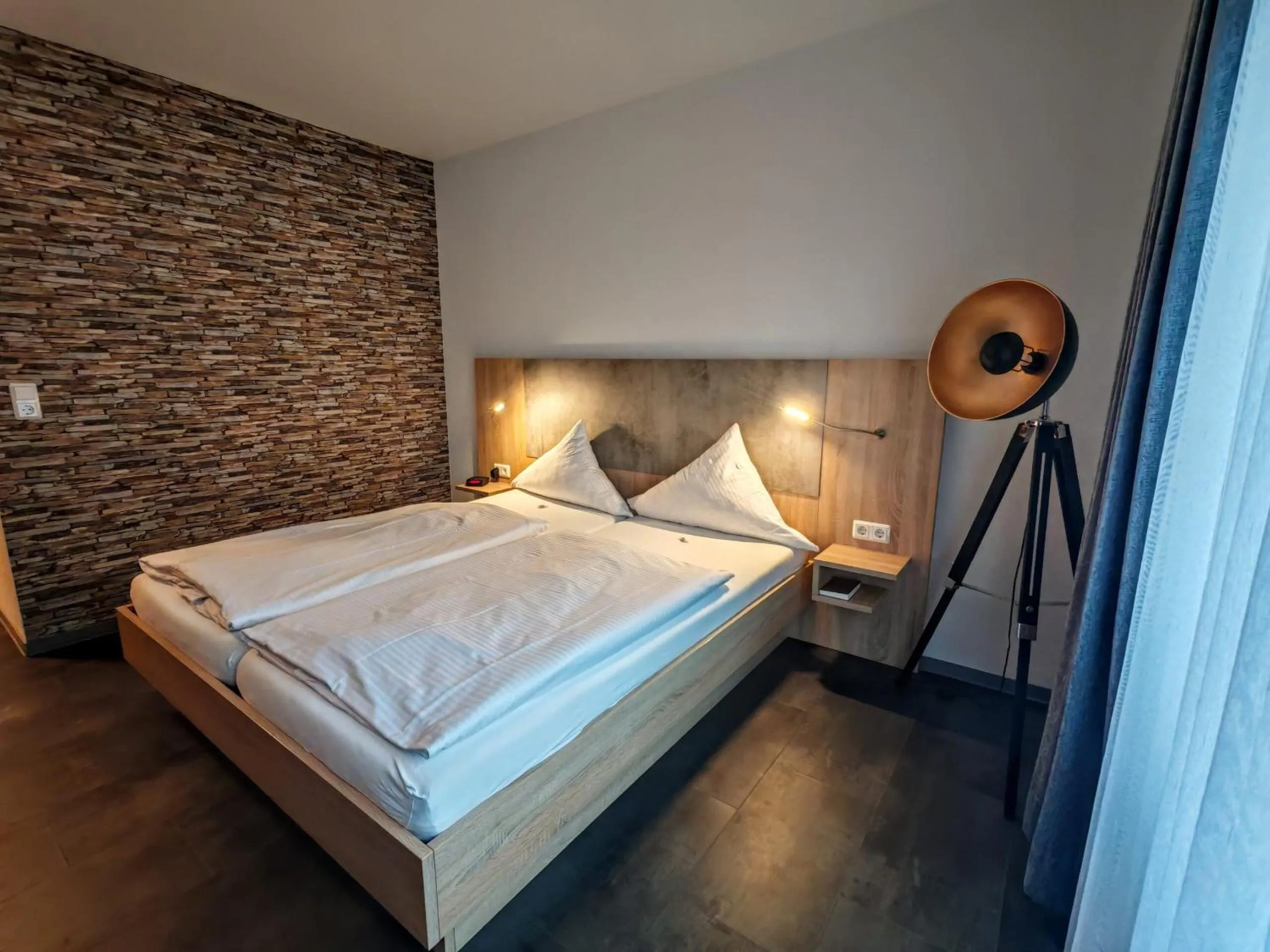 Bed in Hotel Ostfriesen Hof