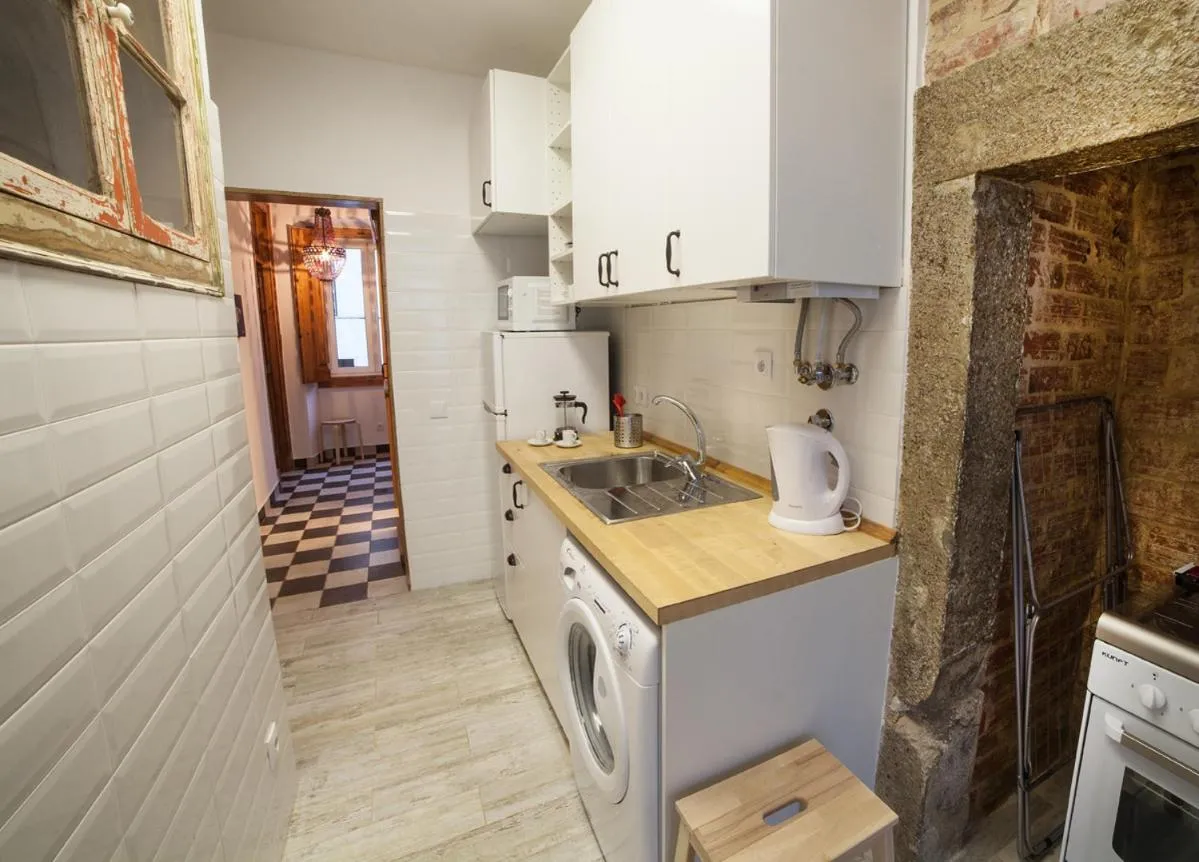 Kitchen or kitchenette in FLH Lisbon Sun Terrace Graça II