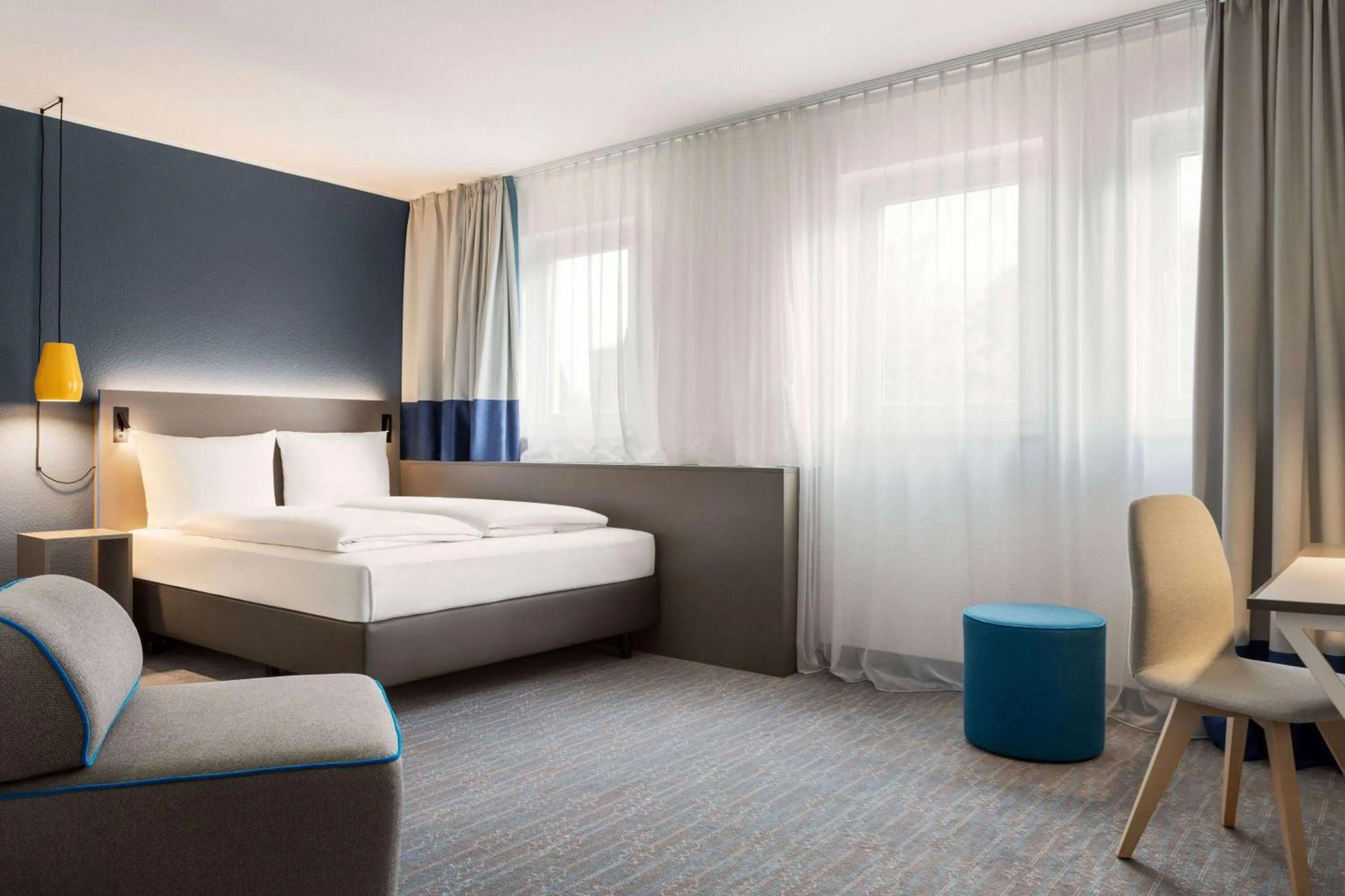 Photo of the whole room, Bed in Vienna House Easy by Wyndham Bad Oeynhausen