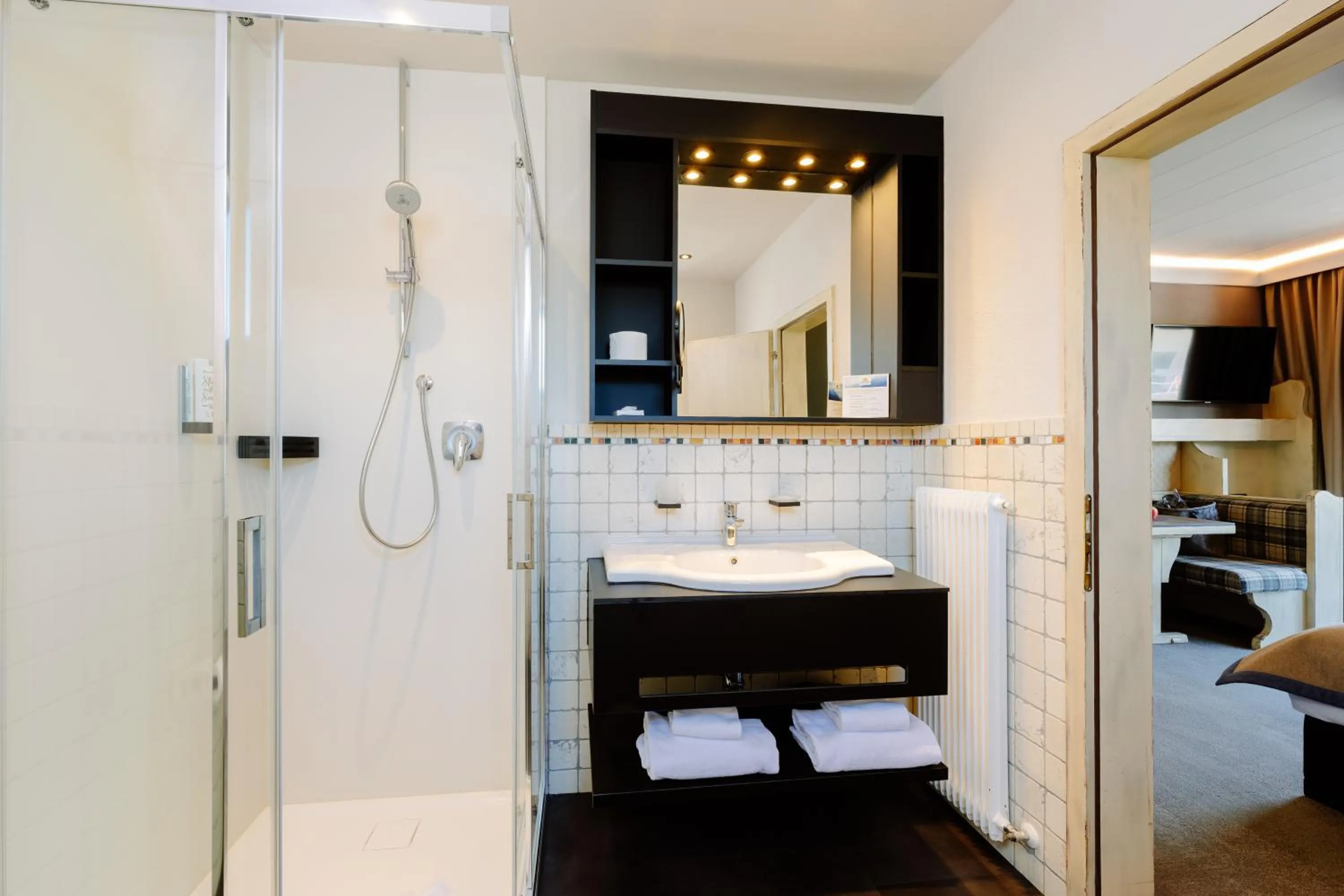 Bathroom, Bed in MONDI Hotel Tscherms