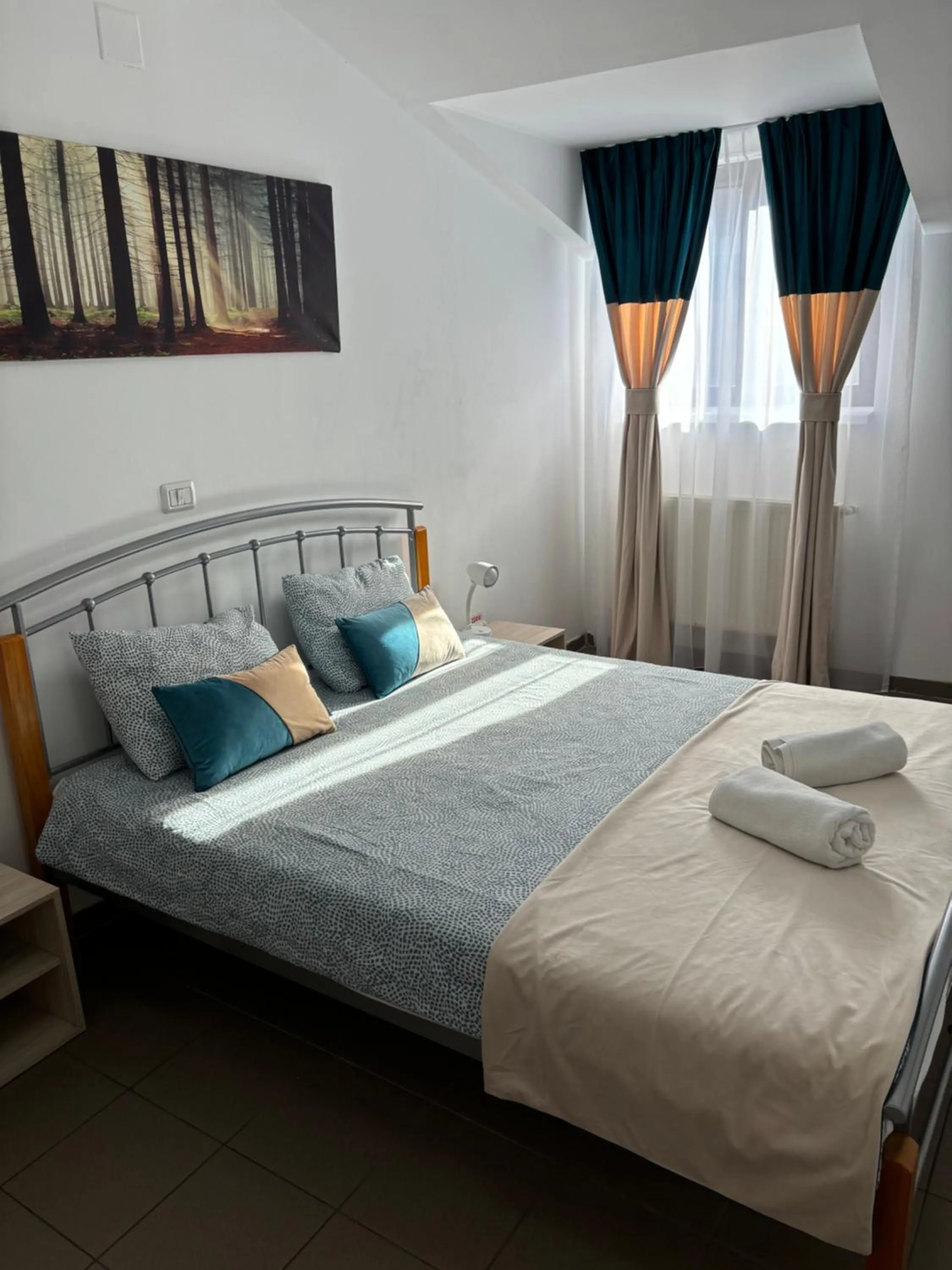 Bed in Piata Uniri Cozy Inn