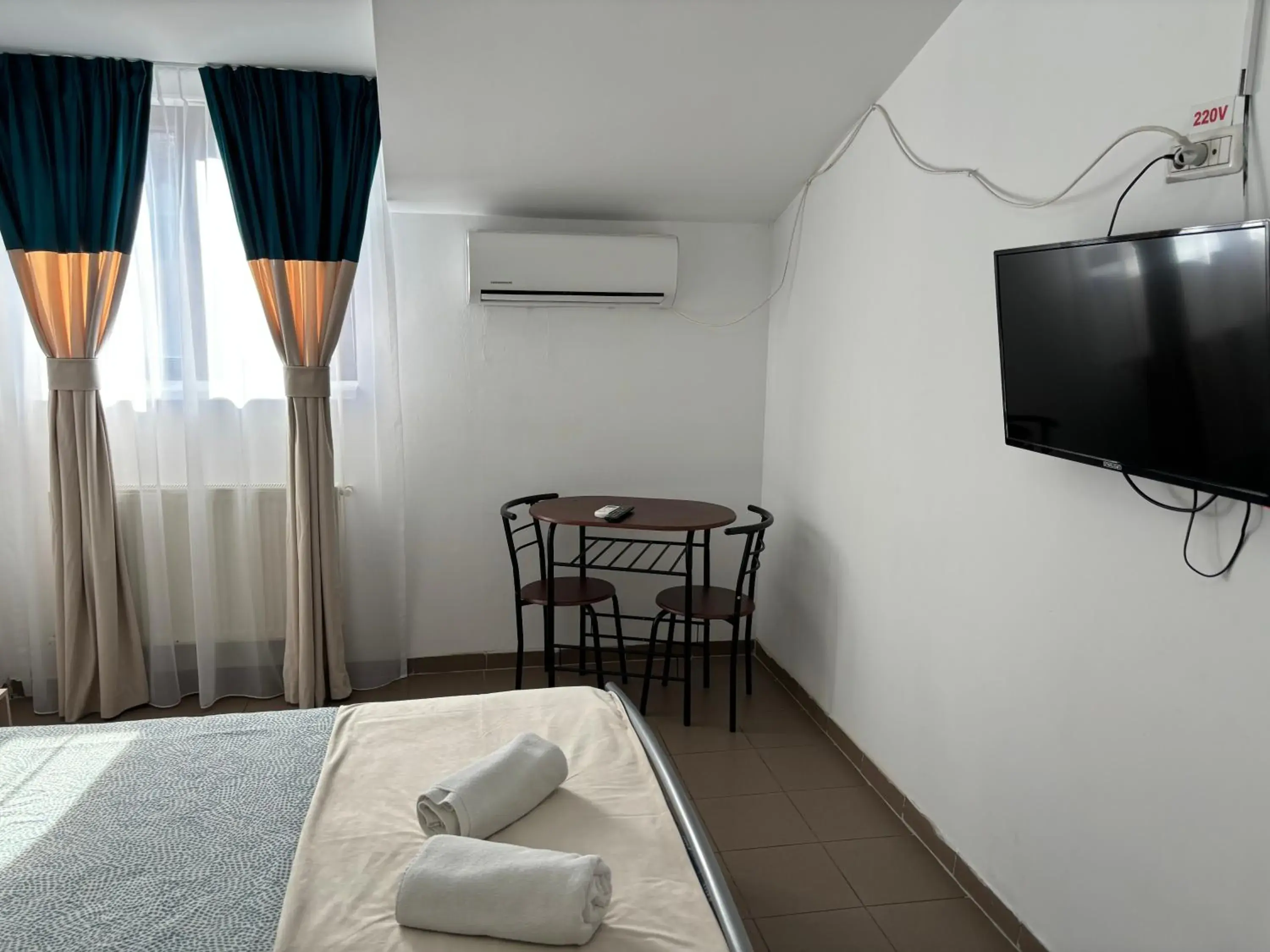 Bed in Piata Uniri Cozy Inn Bed in Piata Uniri Cozy Inn