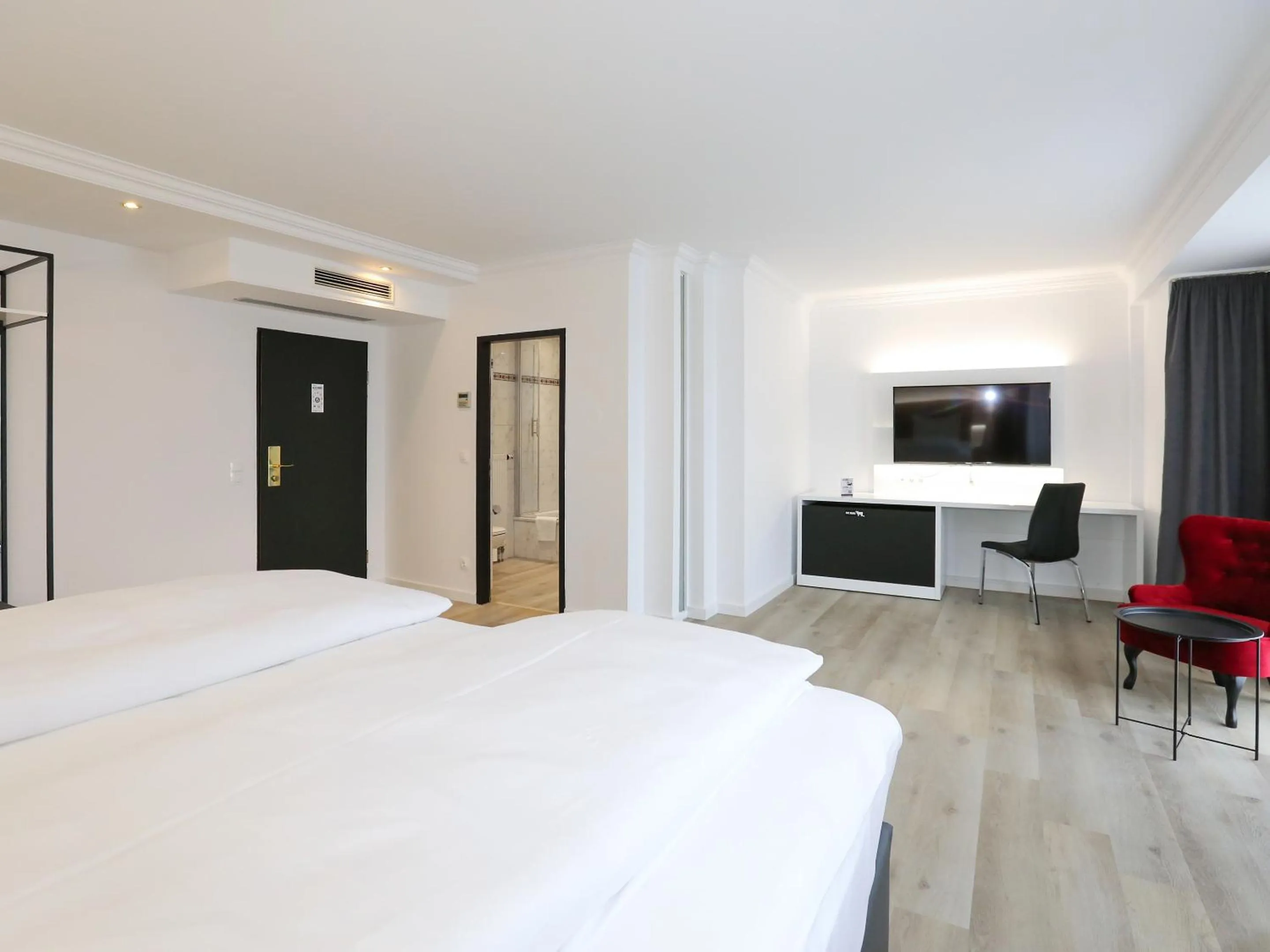 Photo of the whole room, Bed in DORMERO Hotel Meerbusch