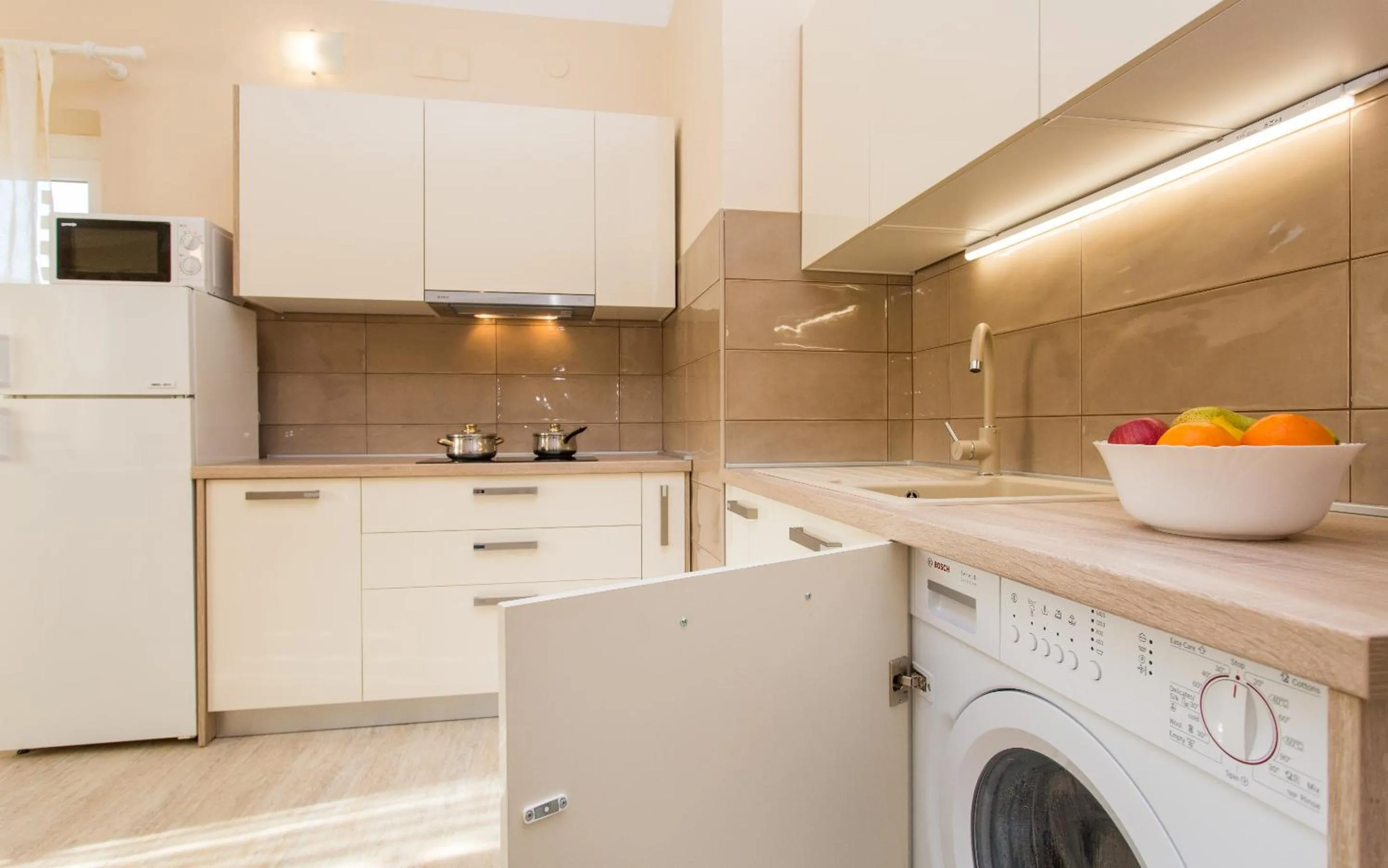 Kitchen or kitchenette in Apartments Polonijo