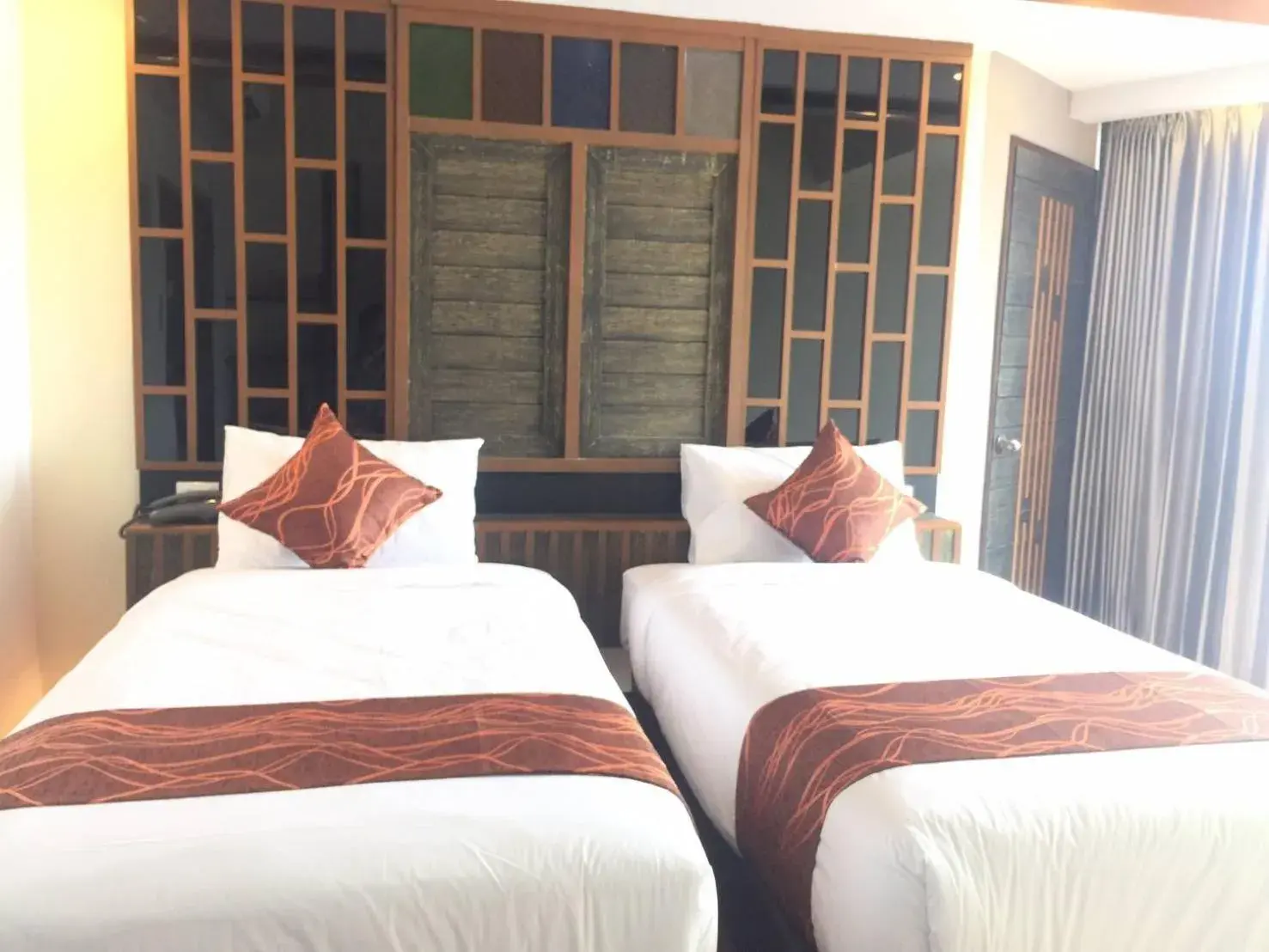 Bed in PS Thungsao Hotel Bed in PS Thungsao Hotel