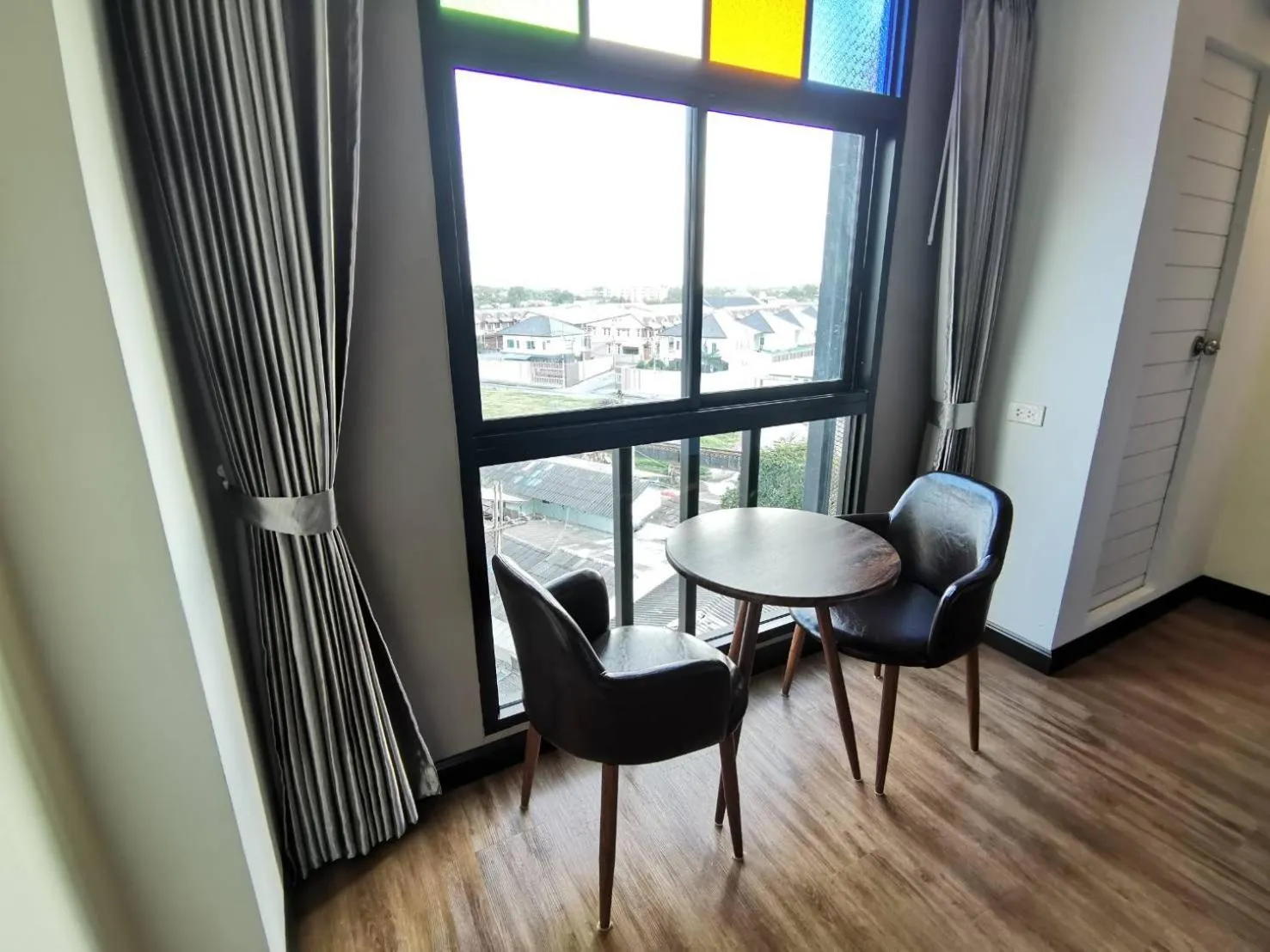 Seating area in PS Thungsao Hotel