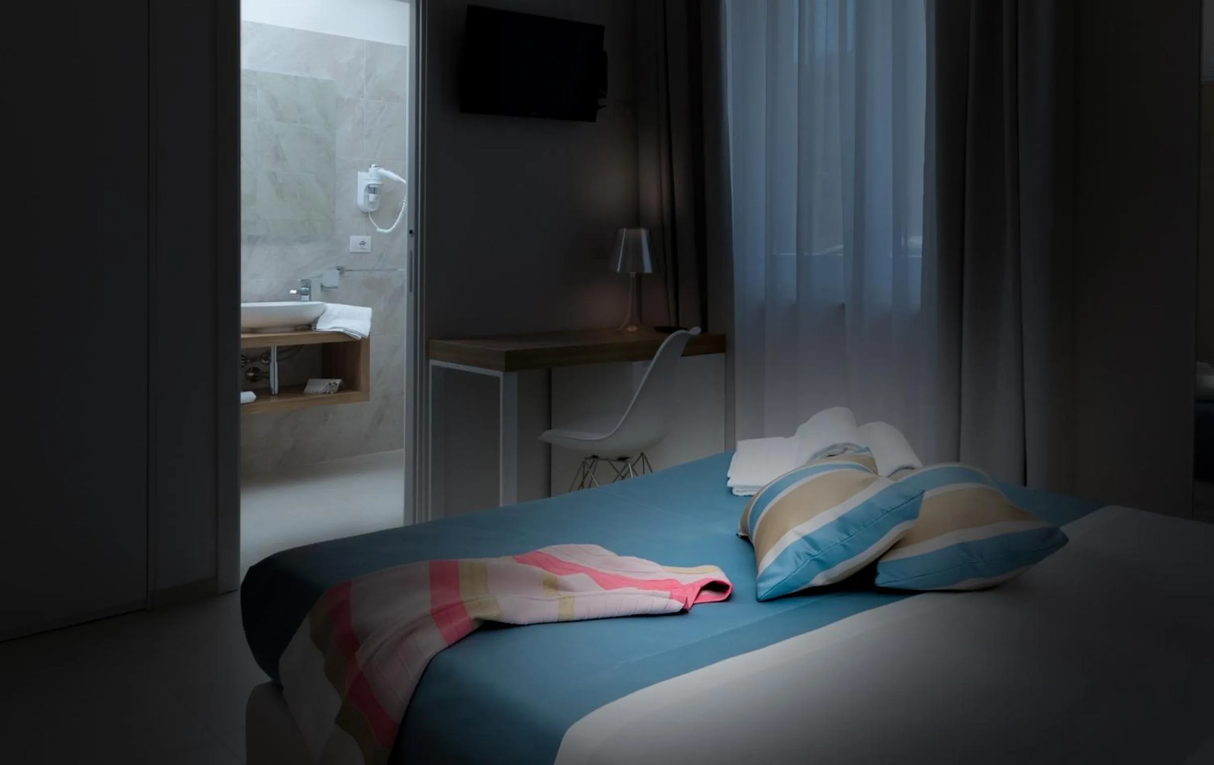 Bed in Artemide Hotel