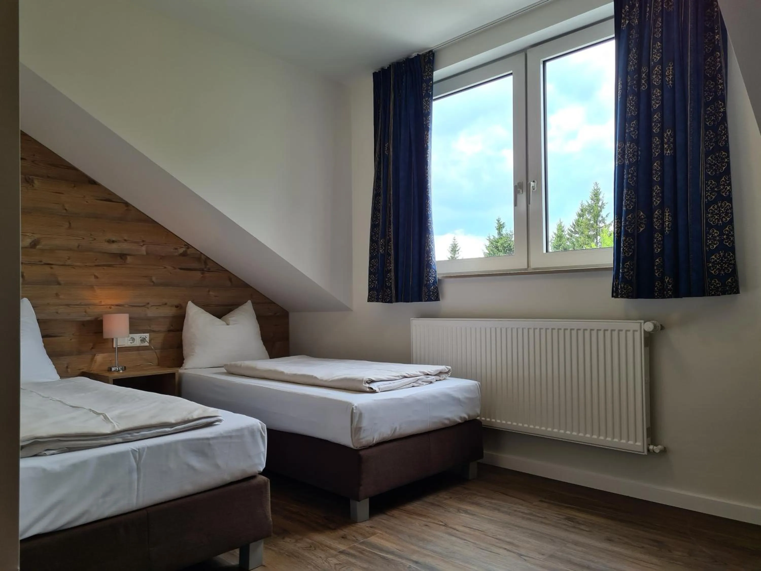 Photo of the whole room, Bed in Hotel Winterberg Resort