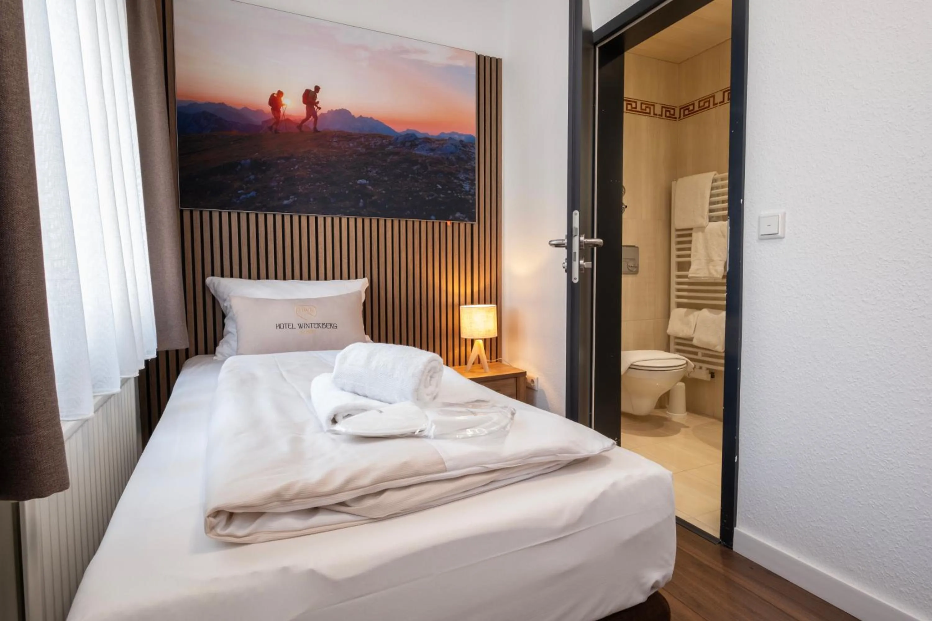 Photo of the whole room, Bed in Hotel Winterberg Resort