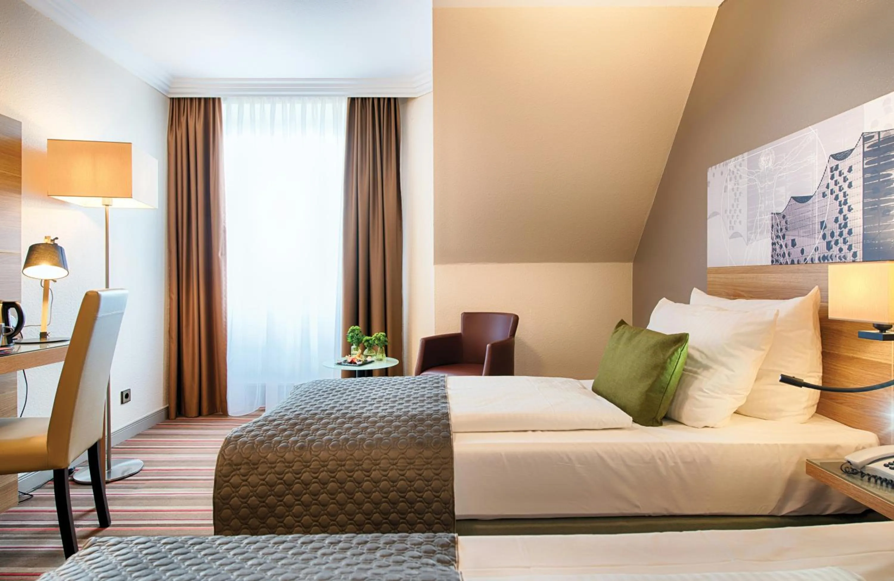 Photo of the whole room, Bed in Leonardo Hotel Hamburg Stillhorn